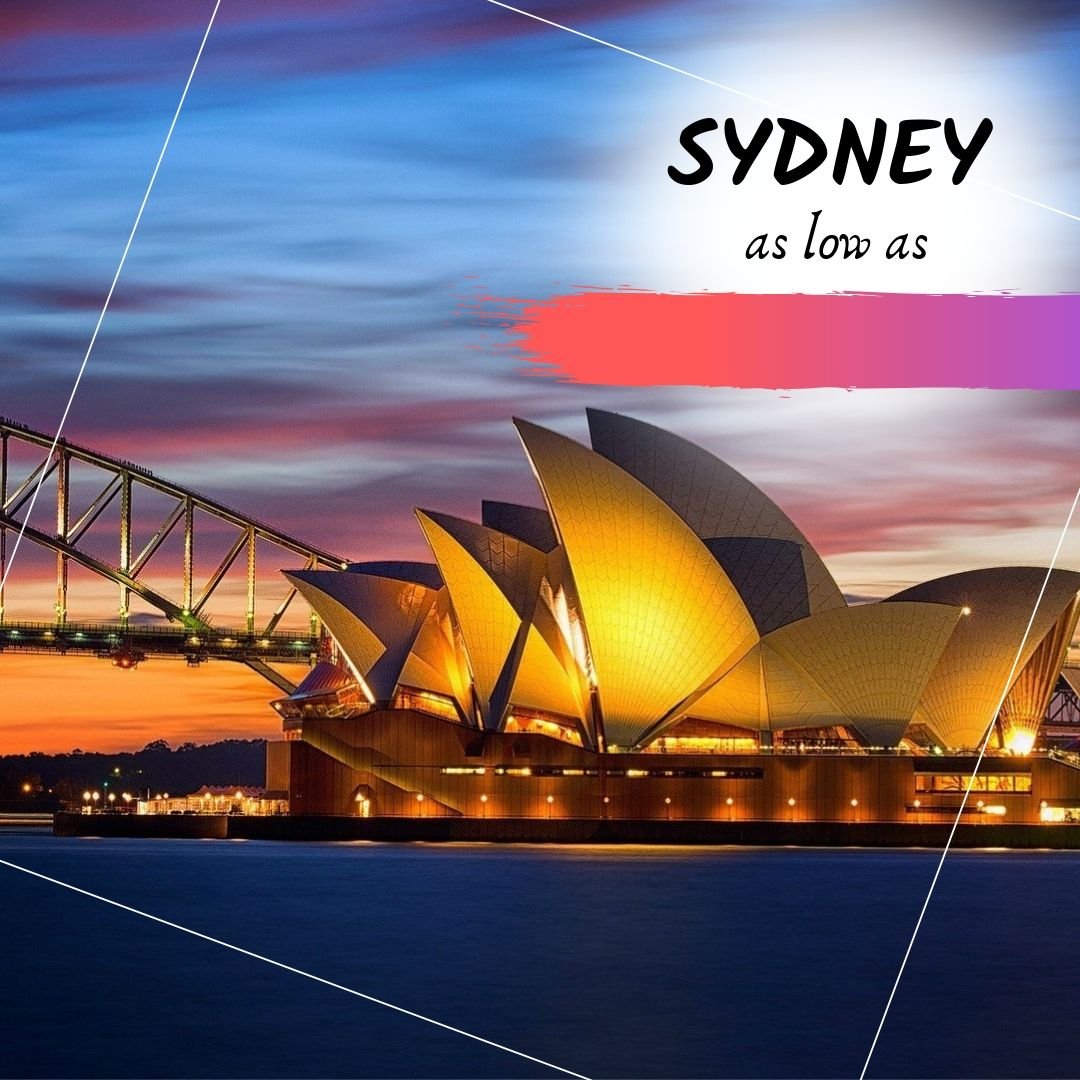 Nighttime view of the Sydney Opera House lit up in gold with the Sydney Harbour Bridge in the background, set against a colorful sunset sky.