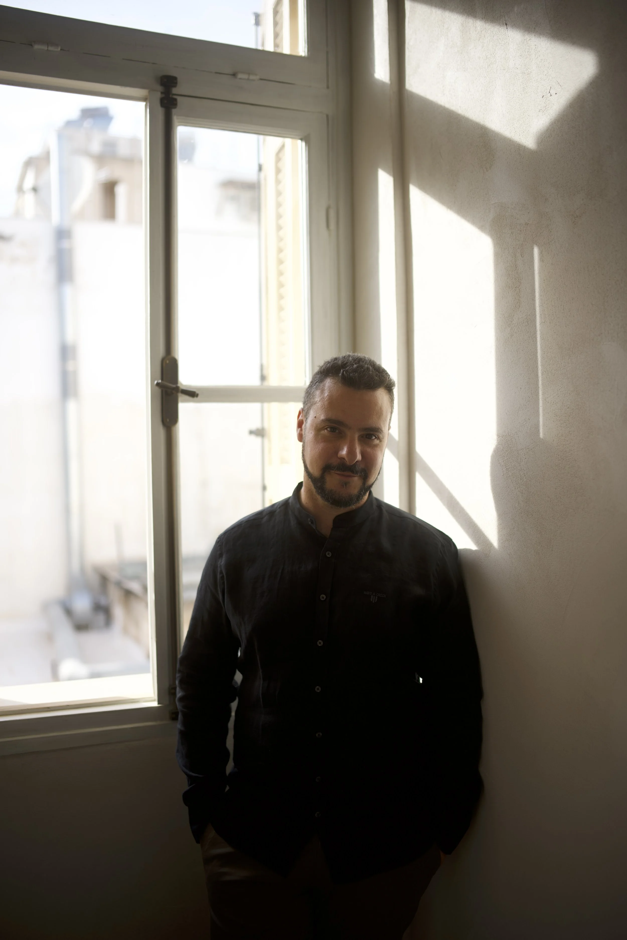 Alexandros Giovanos, Founder and Creative Director of EMIO Films, on set filming classical music.