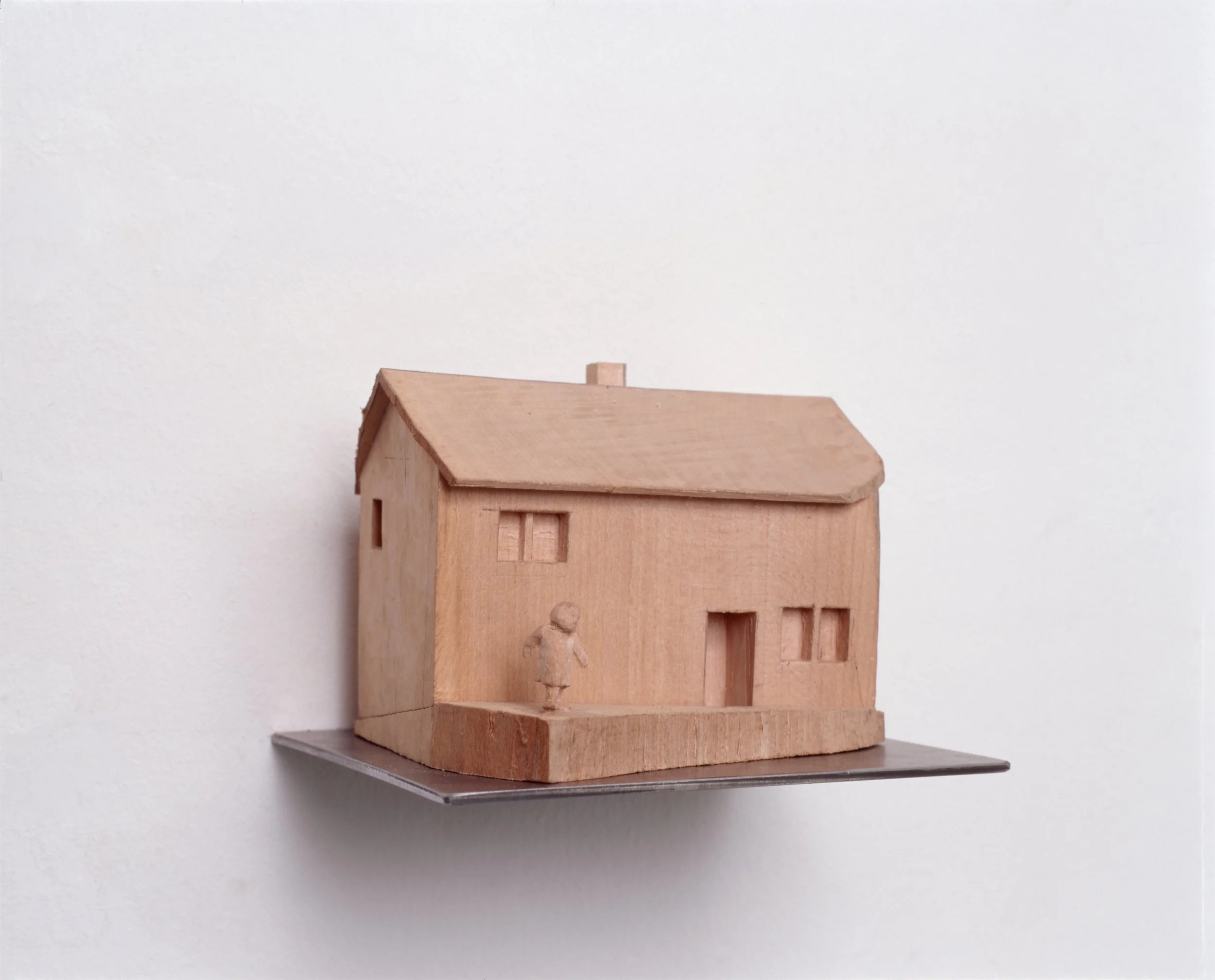 Pauline vor dem Haus, 2002, limewood, steel, pencil, 15 x 15 x 10,5 cm, private collection