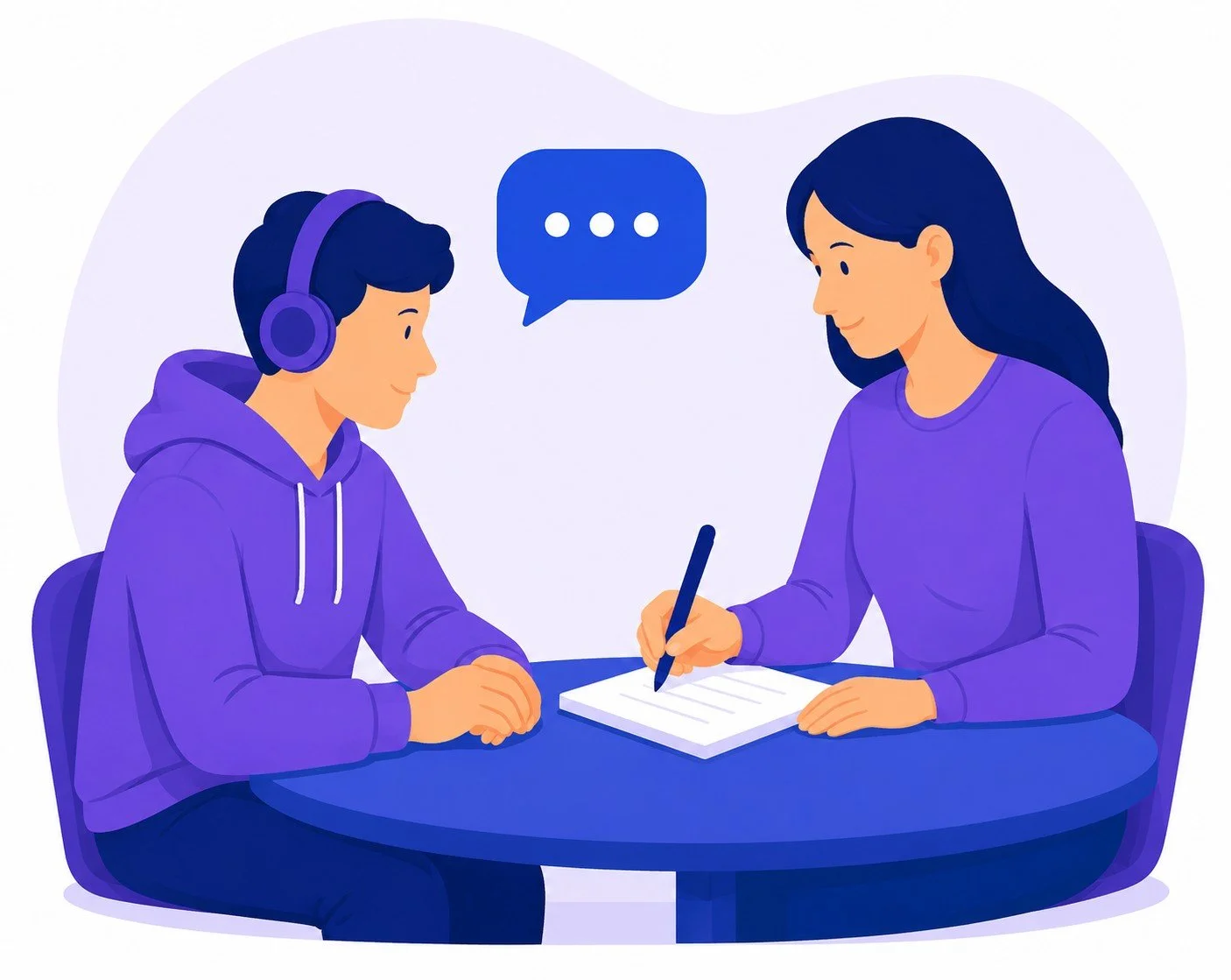 A girl with long dark hair is speaking with a boy wearing headphones, sitting at a blue table, engaging in a conversation. The girl is writing on a notepad with a pen, and a speech bubble with ellipsis indicates dialogue.