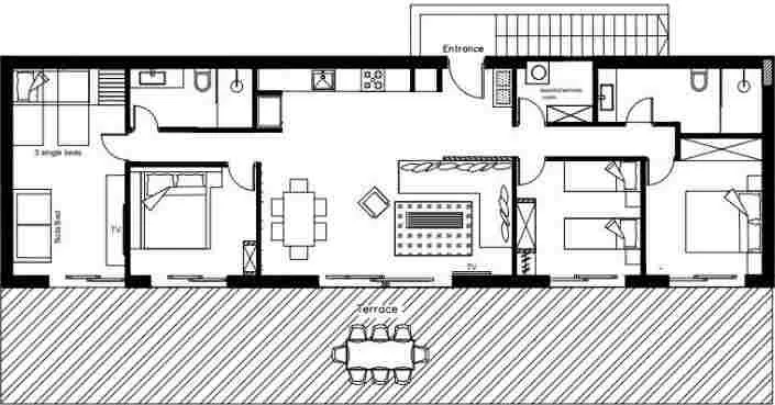 Floor plan of a house with an entrance, kitchen, living room, multiple bedrooms, bathrooms, laundry area, and a terrace with outdoor seating.