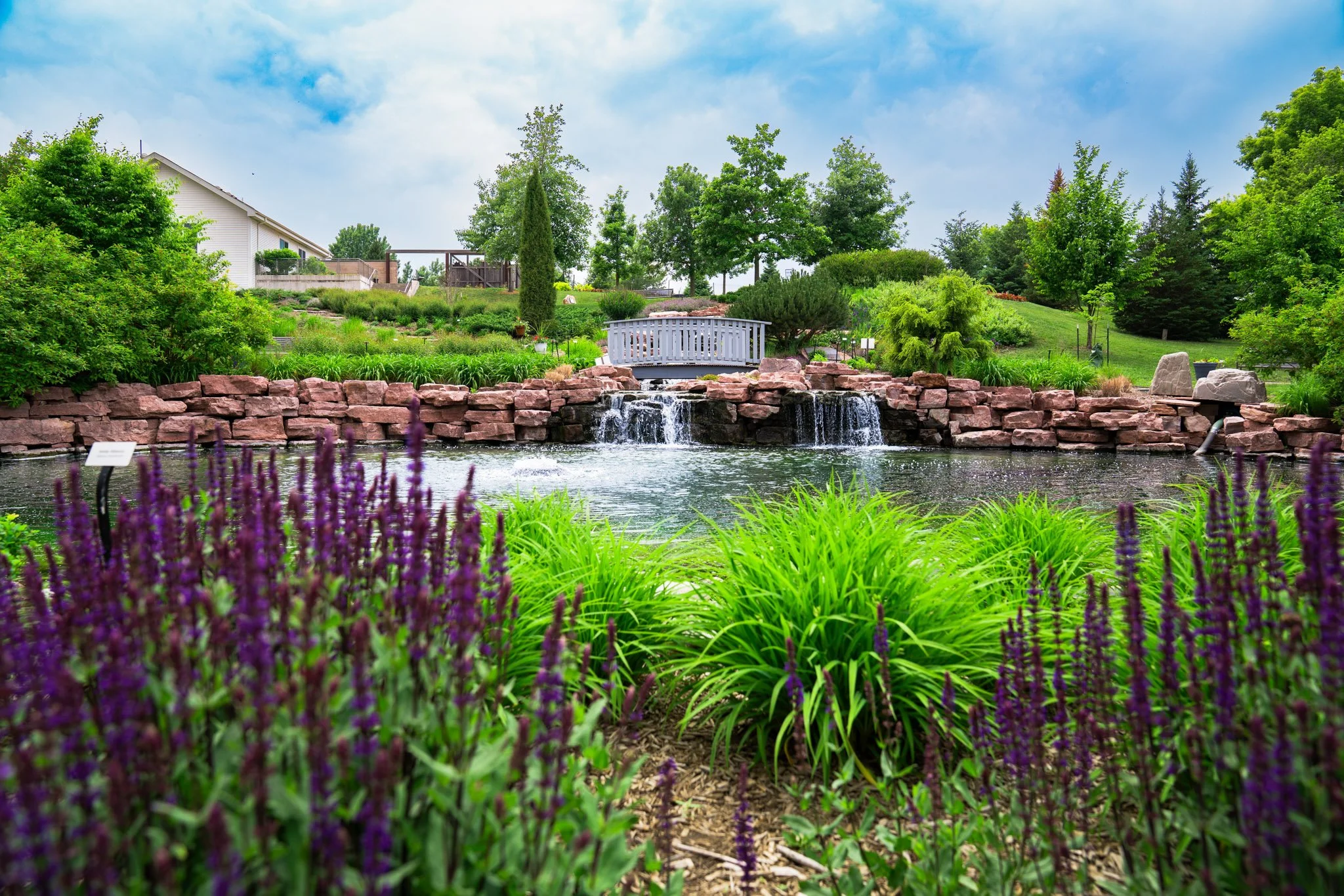 waterfall bridge pond flowers bork productions sioux falls business photography