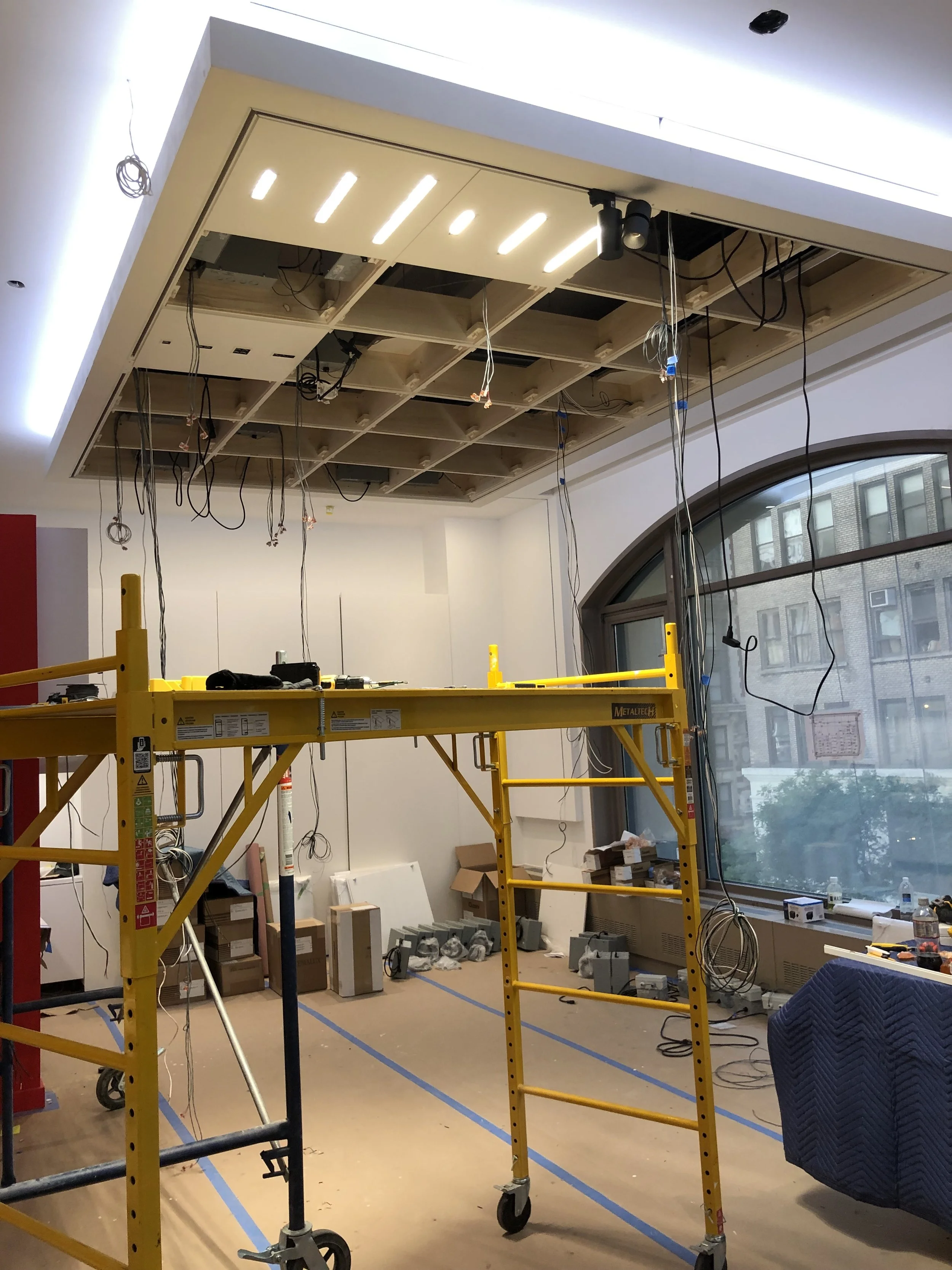 Commercial renovation project completed by Conquest Management, supporting electrical, ceiling infrastructure, and interior construction for a New York City office.