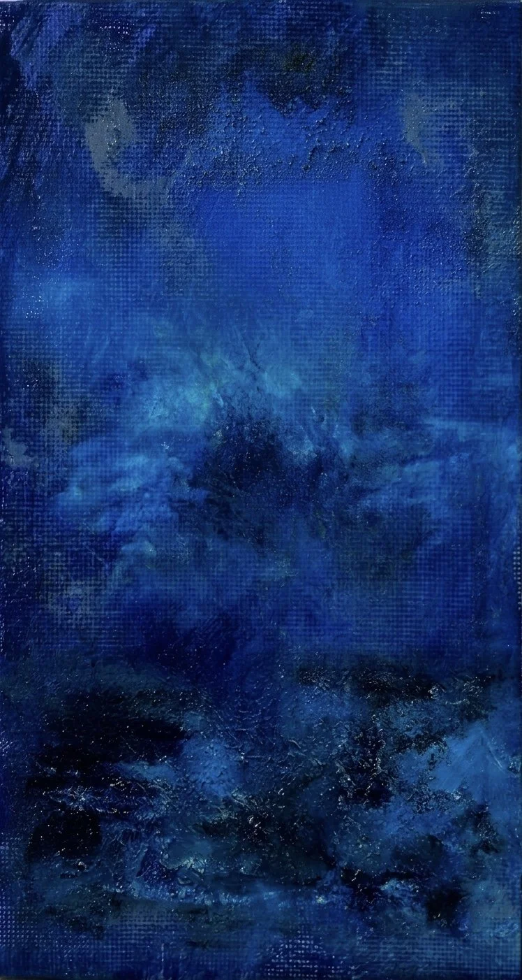 Abstract painting with various shades of blue and textured surface.
