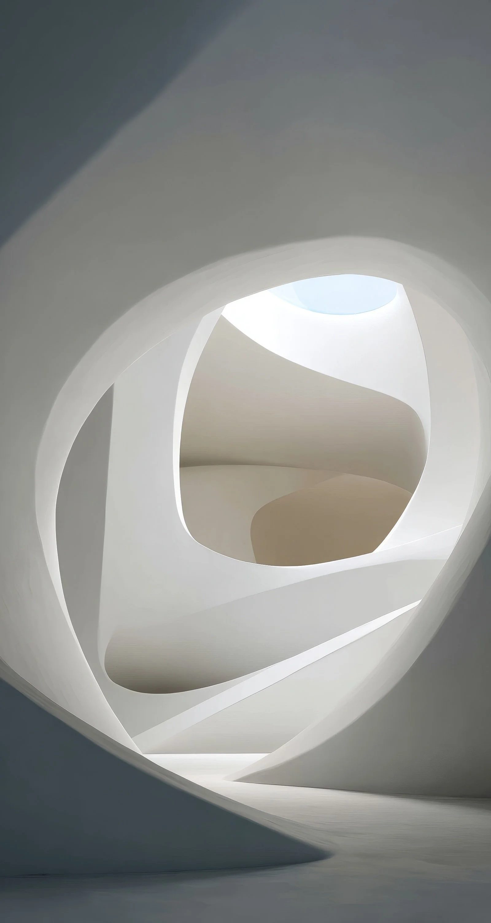 Modern architectural interior with flowing white curves and an opening at the top letting in natural light.