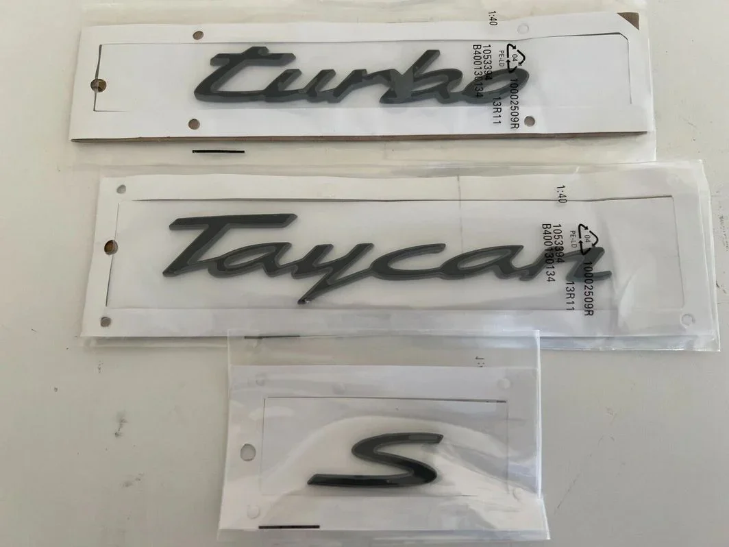 Porsche Taycan Turbo S gloss black emblem kit