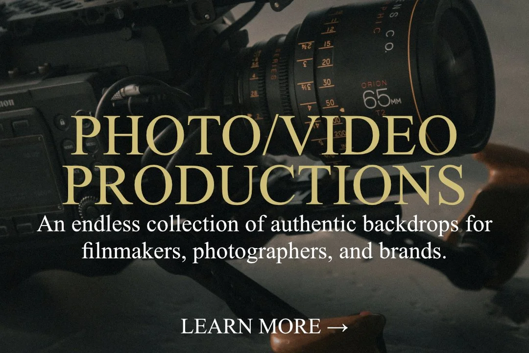 Promotional image for photo/video productions featuring a professional camera with a lens, text overlay advertising authentic backdrops for filmmakers, photographers, and brands, with a 'Learn More' call to action.