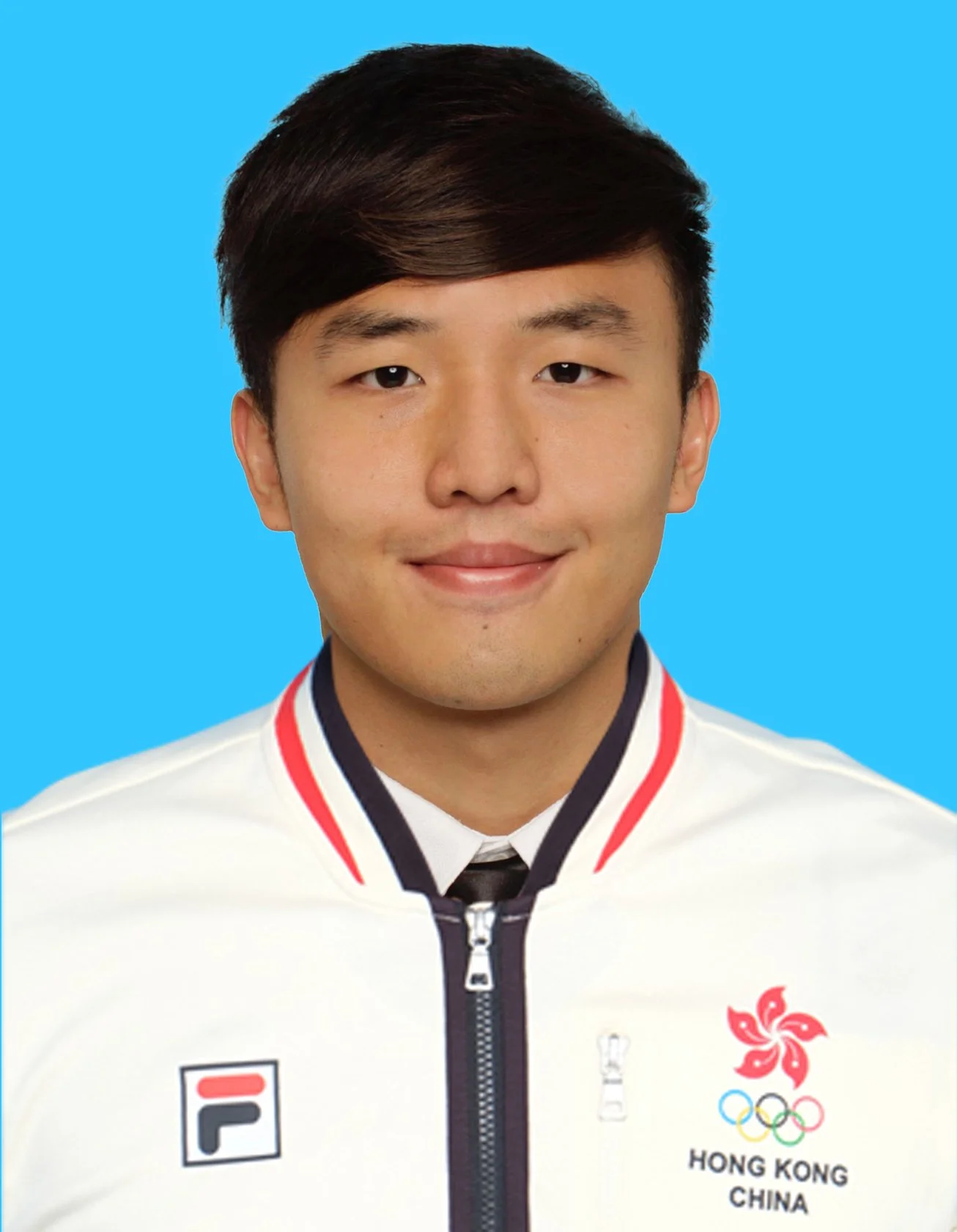 Portrait of a young man with dark hair, wearing a white jacket with a Hong Kong flag and Olympic logo, against a blue background.