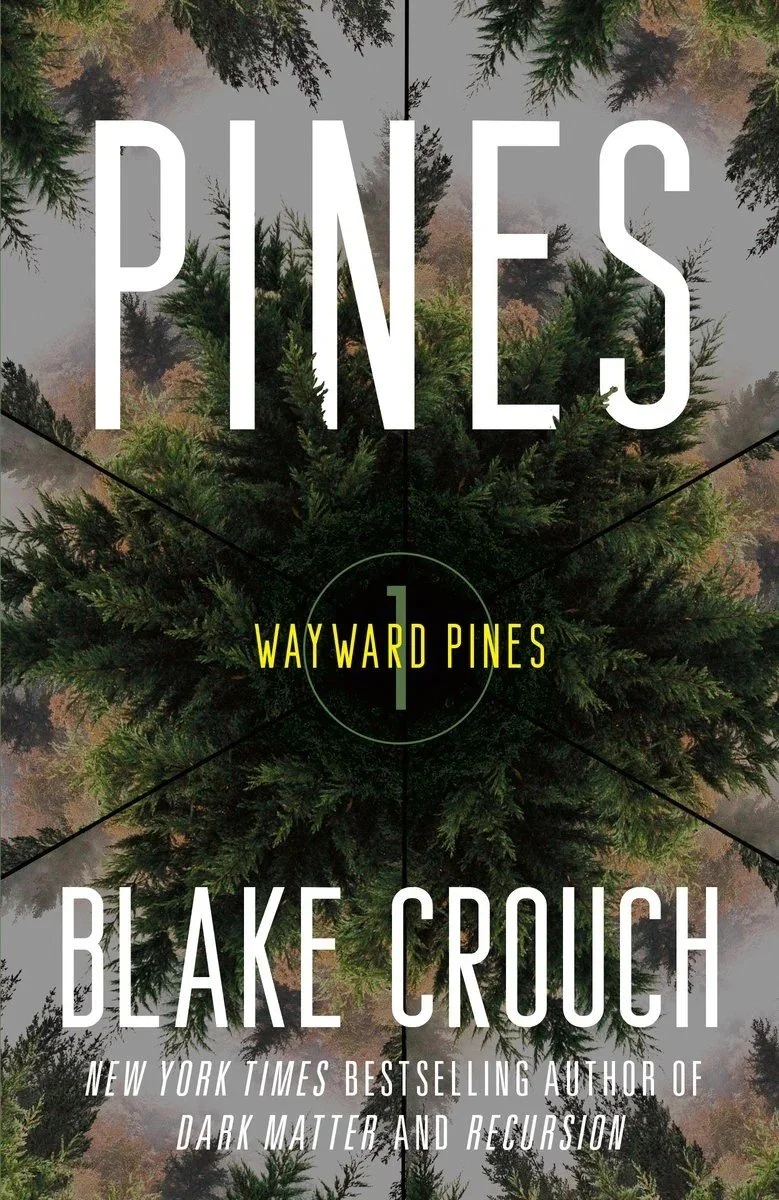 Book cover titled "Pines" by Blake Crouch with a background image of a top-down view of a pine tree surrounded by other trees and mist.