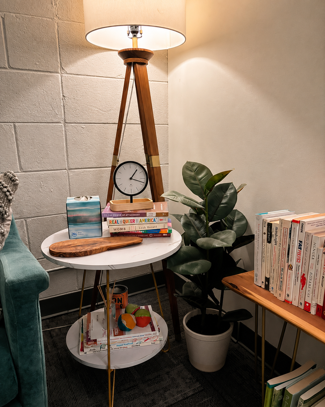 Therapy office bookshelf and counseling resources in Sam Carter-Orbke's Nashville office
