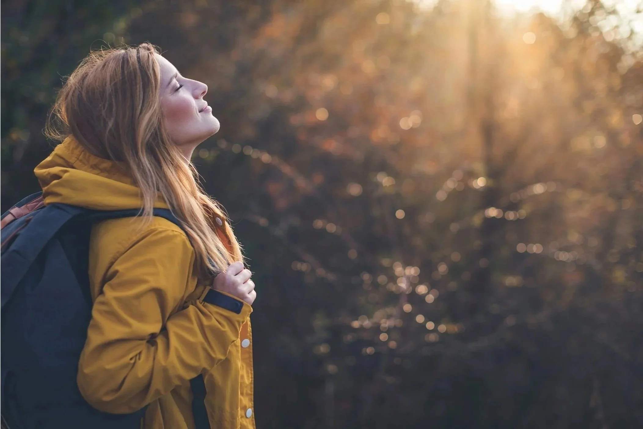 Woman experiencing freedom and healing in her relationship with food and body image