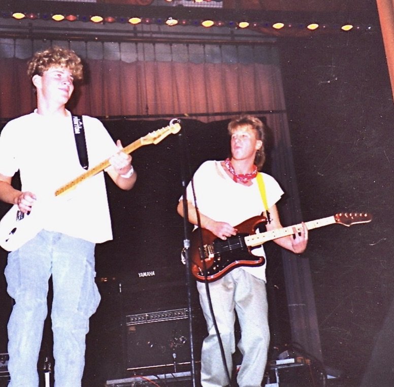 Evan Harrison on stage with Quest EBHS