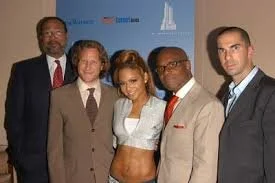 Evan Harrison and Bill Wilson with AOL Time Warner Chairman Dick Parsons during AOL Music era