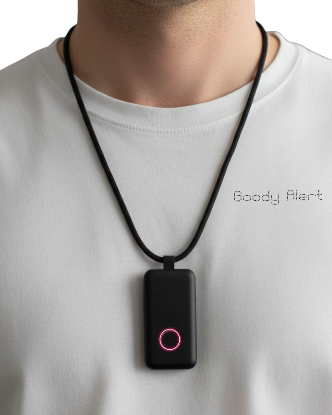 Person wearing a white shirt with the text 'Goody Alert' on it, and a black medical alert device hanging from a lanyard to show how small and modern the Goody Alert device is.