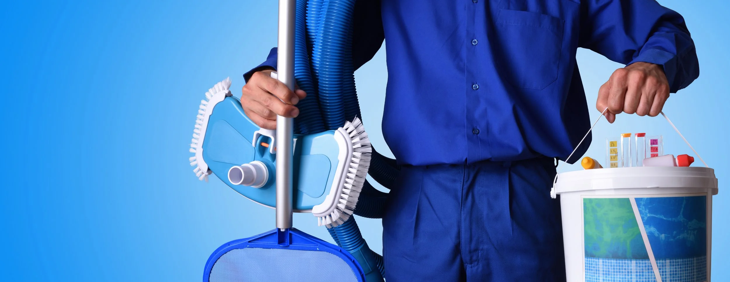 Person in blue uniform holding cleaning equipment and a bucket with test tubes and cleaning supplies against a blue background.