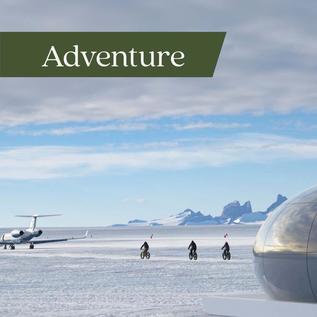 Snow-covered landscape with a small airplane, three cyclists riding on snow, and a futuristic metallic object in the foreground, with distant mountains and a cloudy sky.