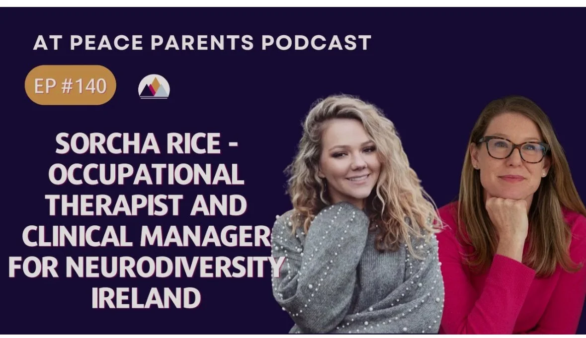 Podcast cover for 'At Peace Parents' featuring two women, one smiling with curly blonde hair wearing a grey sweater, the other with straight, blood hair, glasses, and a pink sweater, sitting with her chin resting on her hand, against a dark purple background.