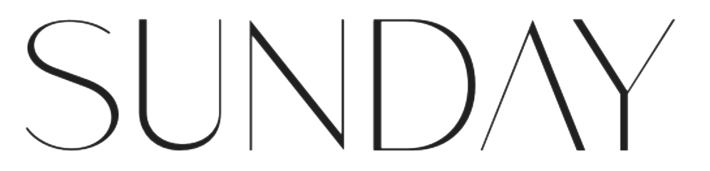 The word "SUNDAY" in large, thin, black font on a white background.
