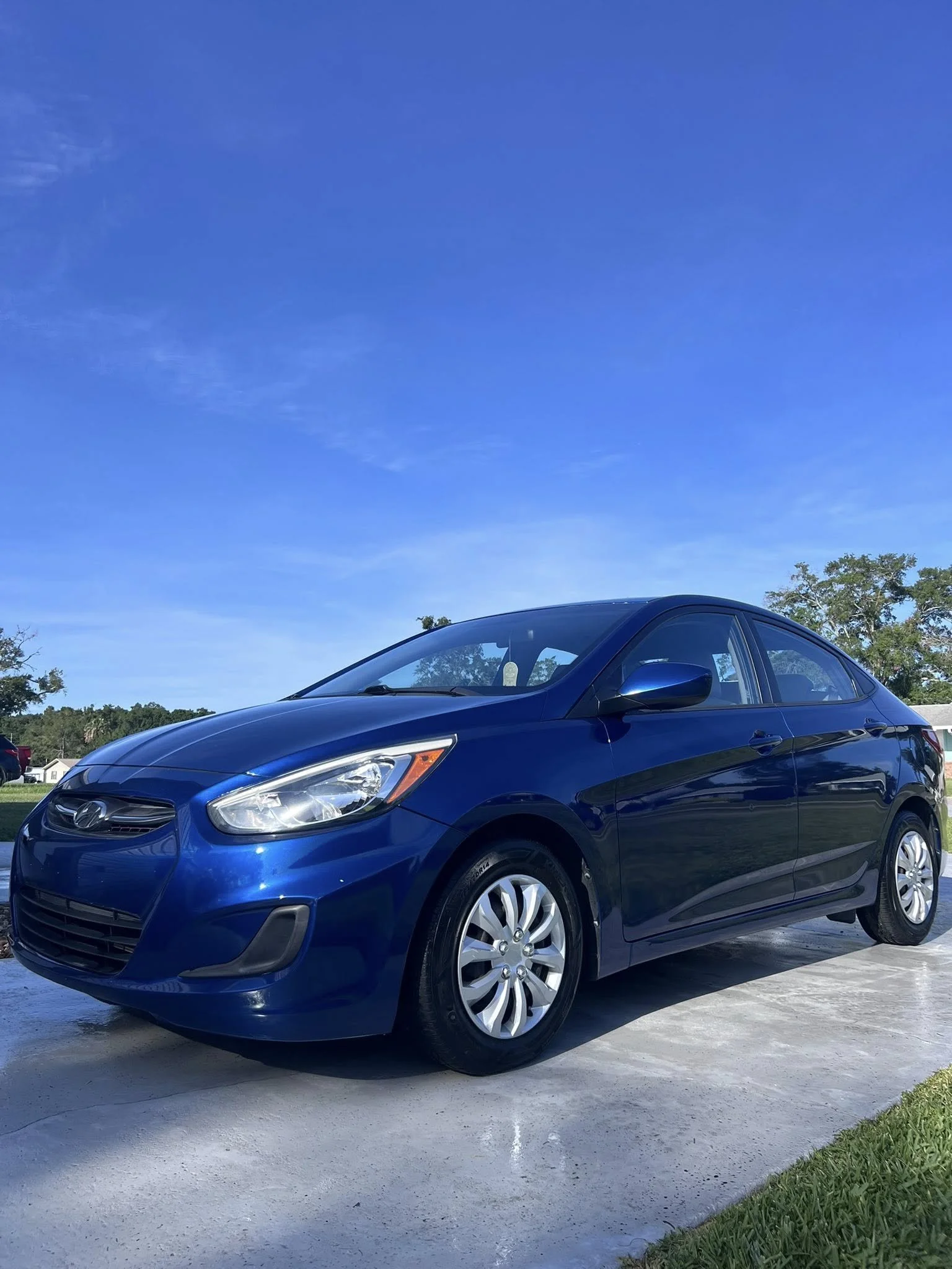 Freshly detailed sedan with a glossy, showroom-quality finish after a complete mobile detail in Ocala, FL
