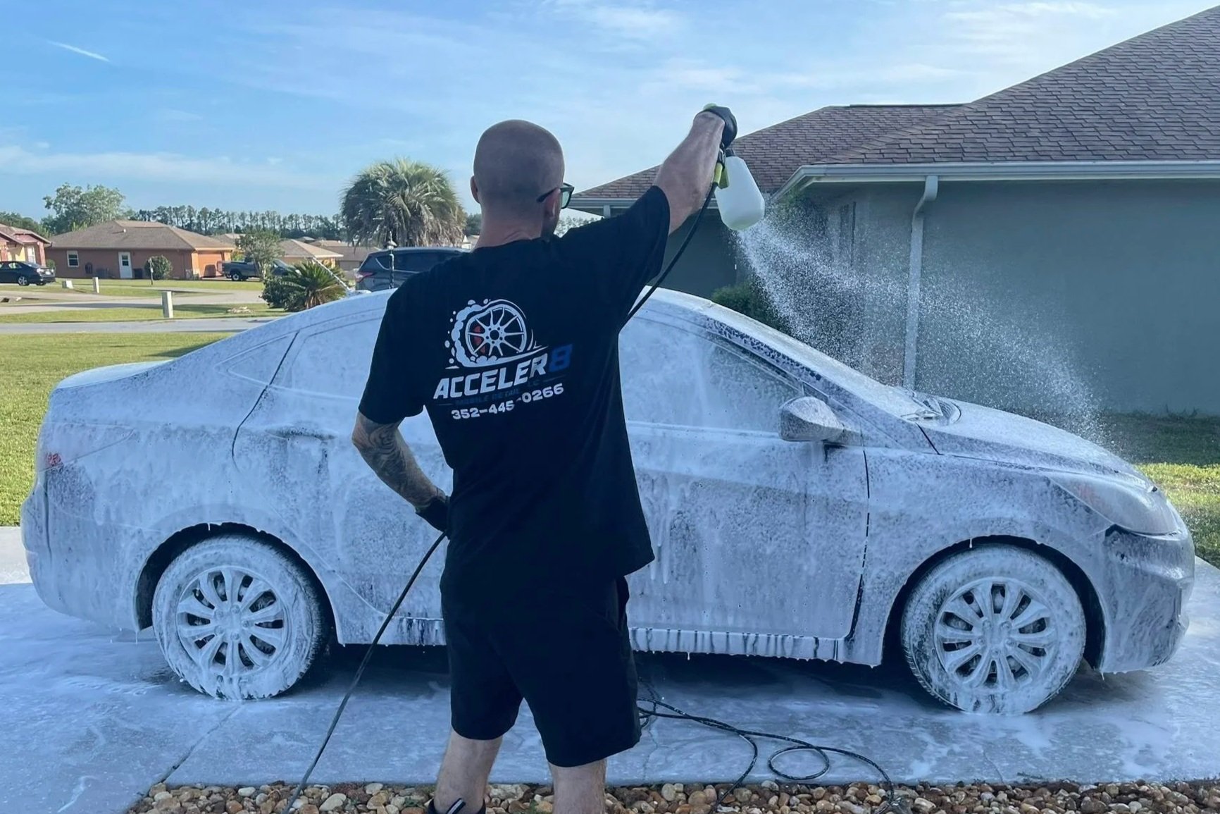 Foam cannon exterior wash performed by a professional mobile detailing service at a customer's home in Belleview, FL