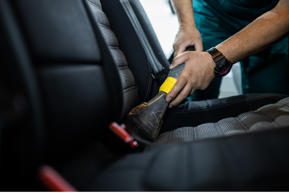 Deep interior car detailing with professional seat extraction to remove dirt and stains in Ocala, FL