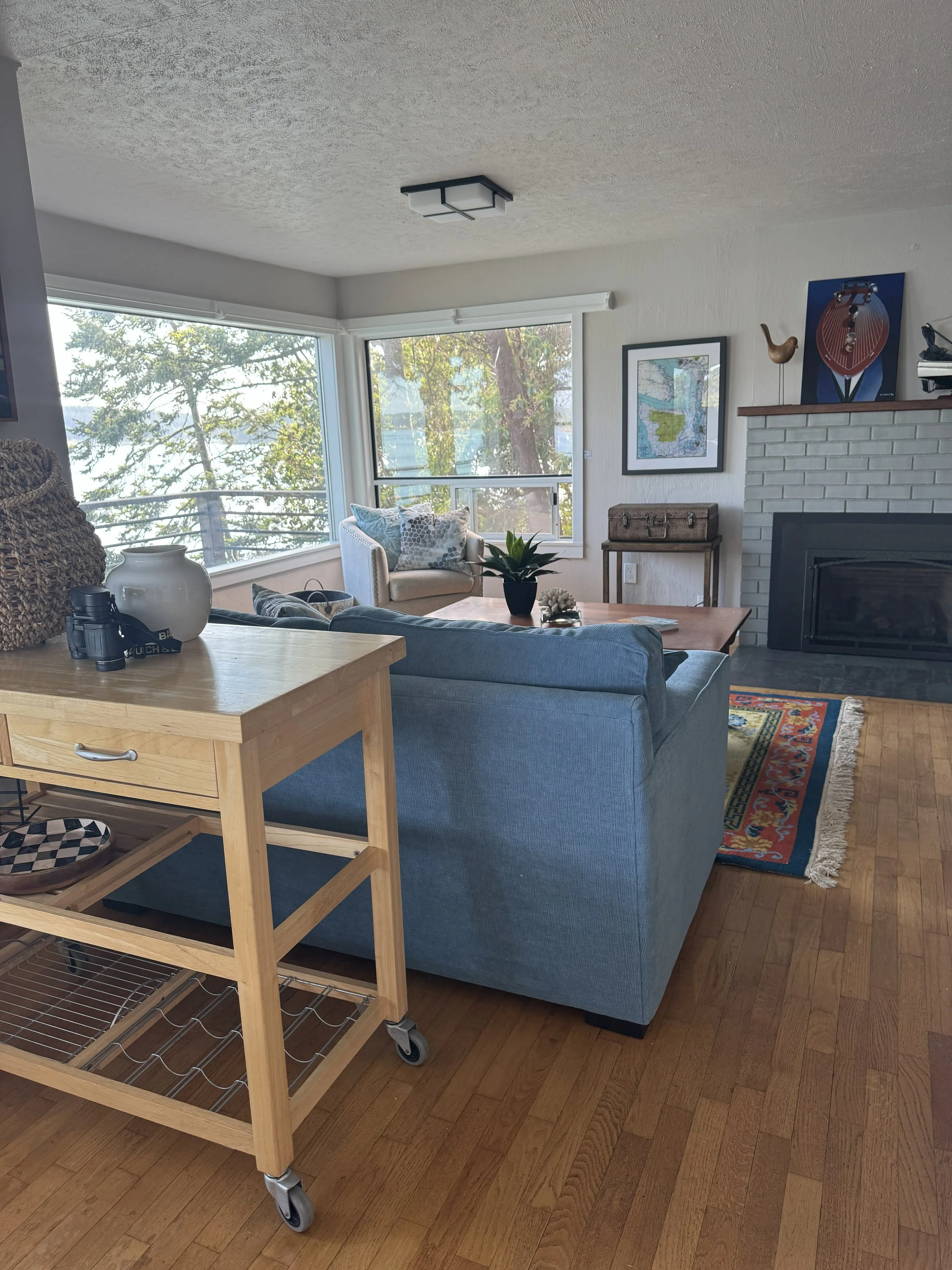 Look west from the dining nook and you will see more of the Deception Pass Waterway.  Cornet Bay on Whidbey Island is your view to the left and the Deception Pass bridge is due west.  There are outstanding sunset views from the living room.