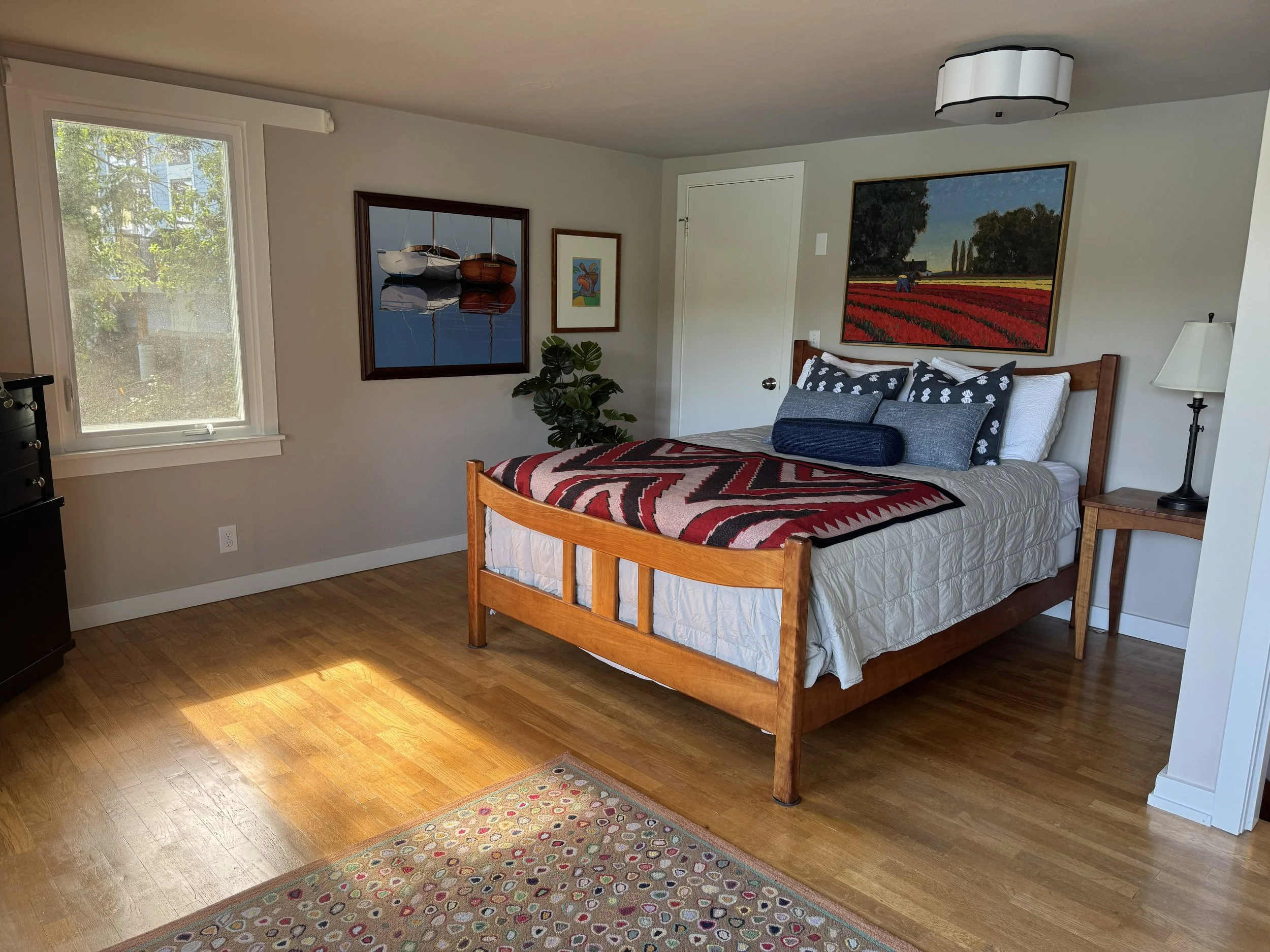 The master bedroom has windows on the east, west and south.  The water way, sunrise and sunset views from this room are world class. 
