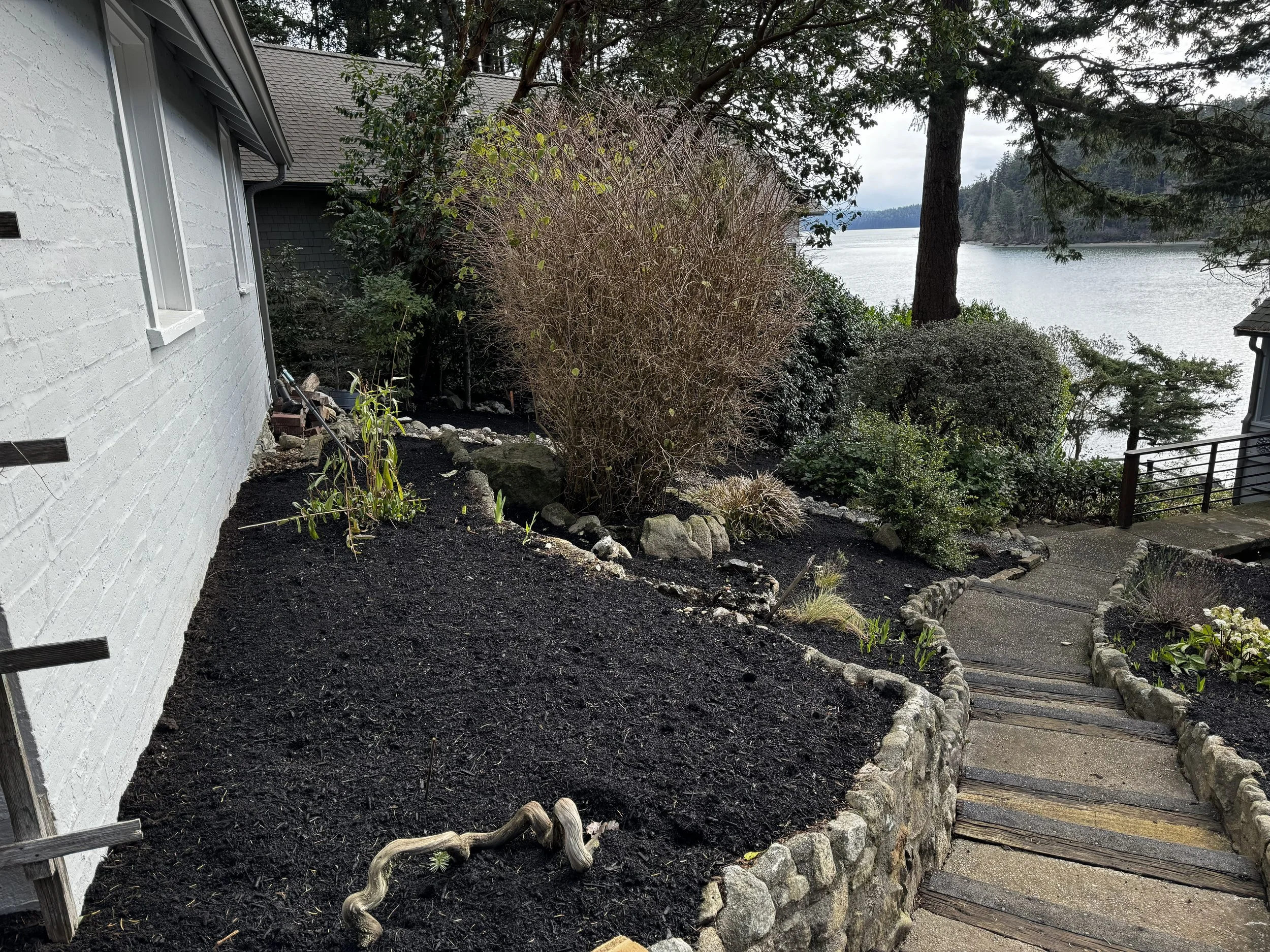 As you walk down to the house, you view northeast tip of Whidbey Island, and the Cascades are visible across the water and above the Skagit foothills. 