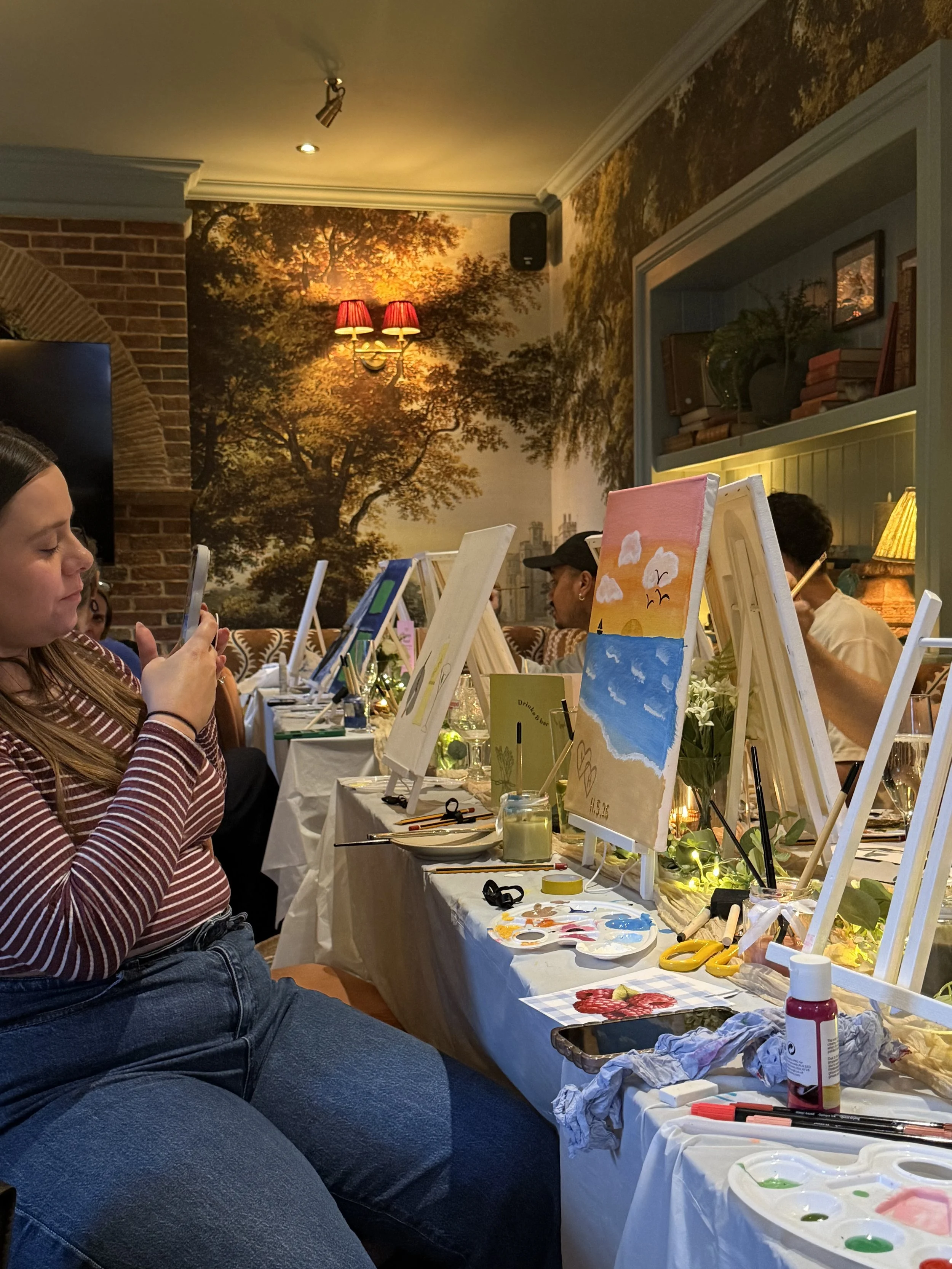 guests-painting-at-easels.jpeg
