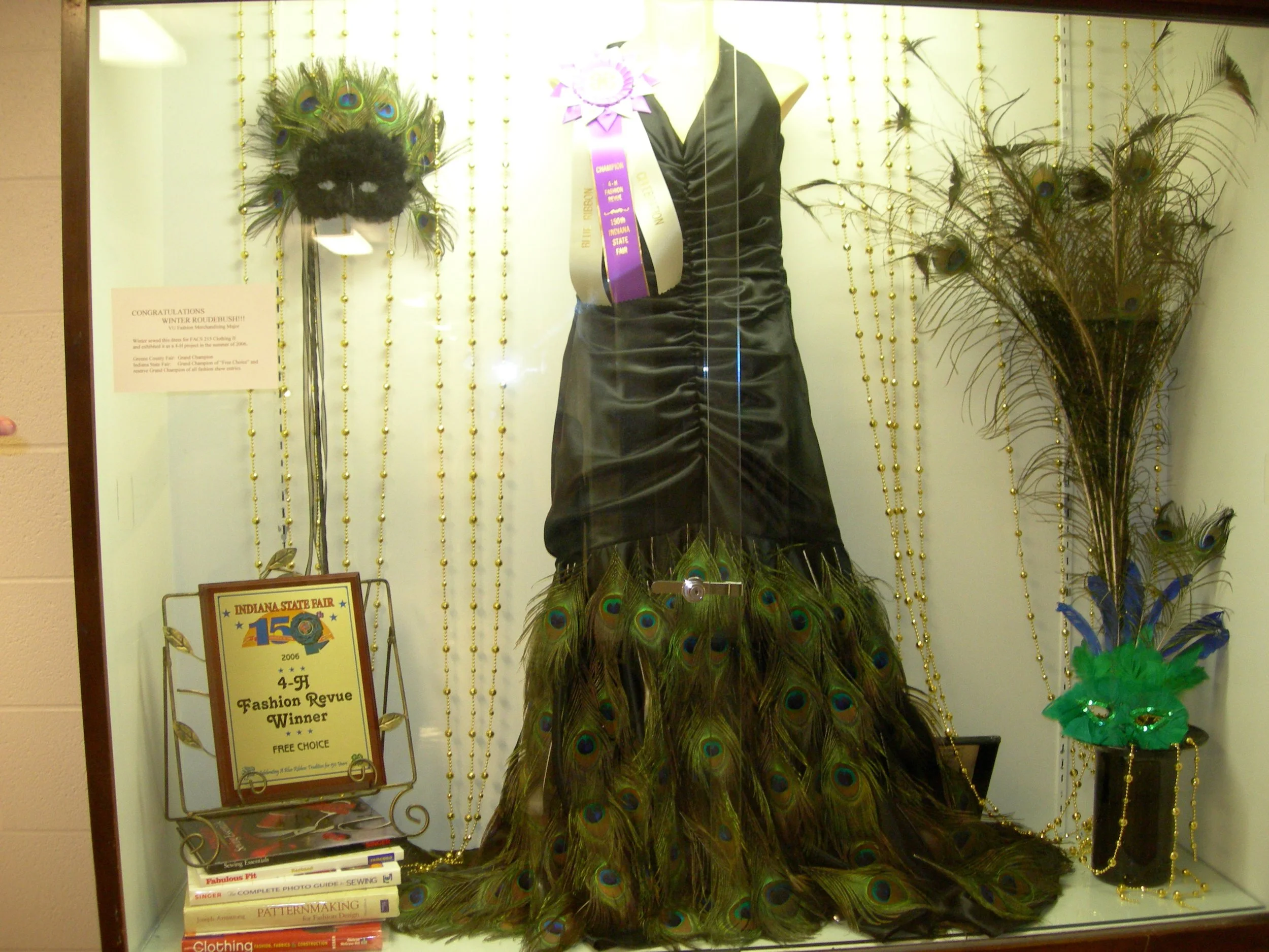 Winter's hand sewn Peacock Dress
