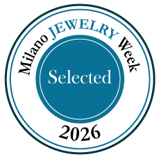 Logo for Milano Jewelry Week 2026, featuring a circular design with blue and white colors and the words "Milano Jewelry Week," "Selected," and the year "2026."