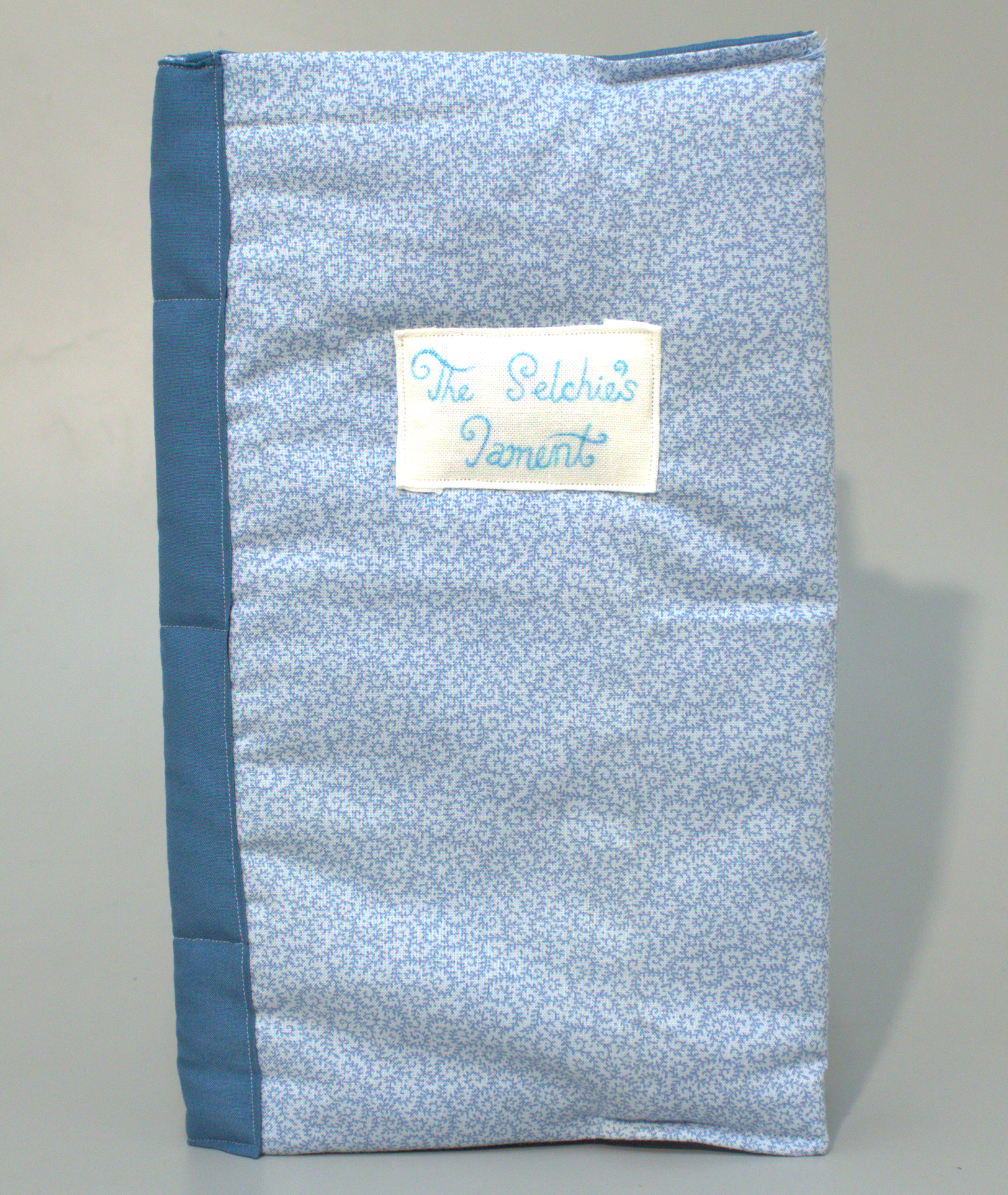 Image displaying the physical, hand-bound version of The Selchie’s Lament, 2026.