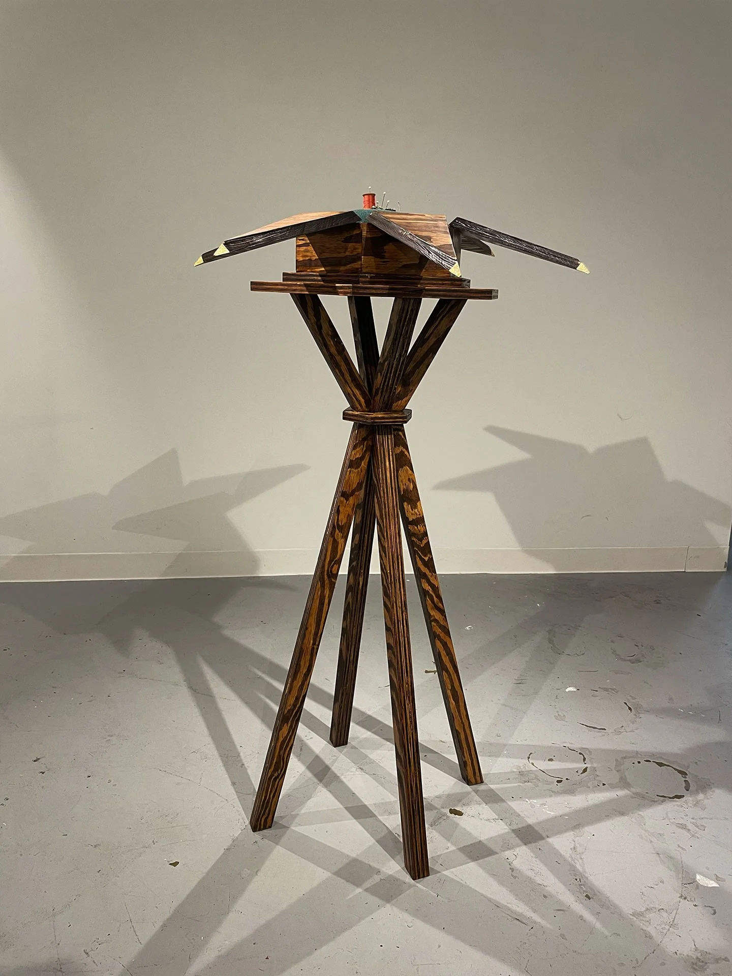 "Reliquary", 2025. Wood, brass hinges, gold leaf, fabric, thread, thread snips, sewing pins