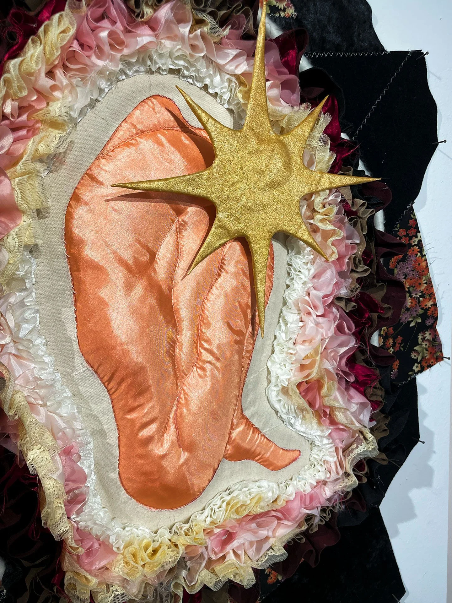 "Soulbirth", 2026. Various polyester fabrics, canvas, cotton, suede, embroidery floss, cardboard, Polyfill, small nails.
Featured in the 2026 Senior Thesis Exhibition at Rhodes College.