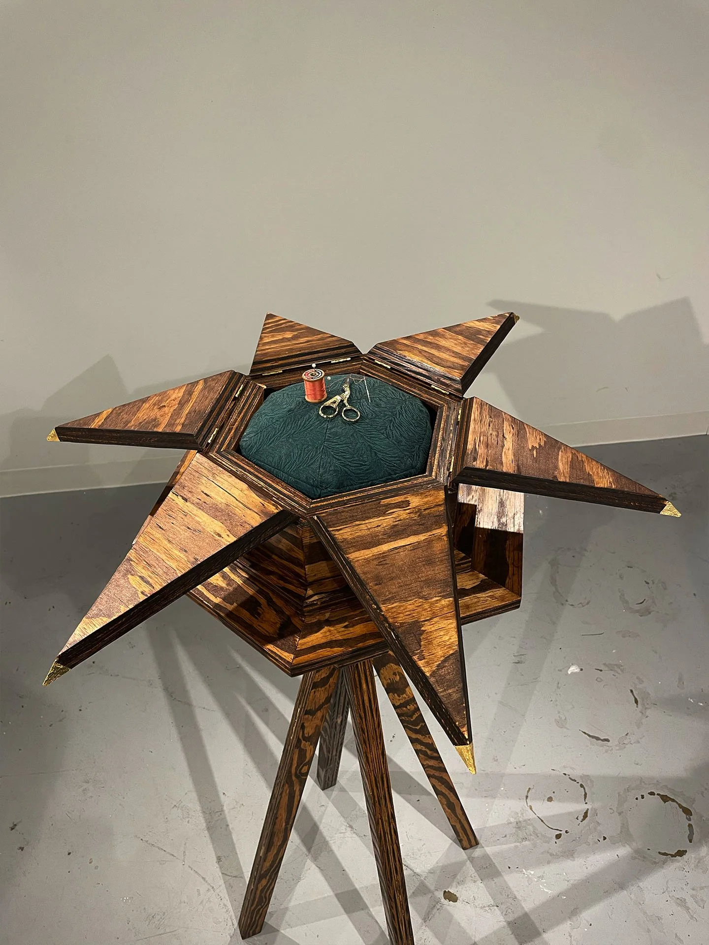"Reliquary", 2025. Wood, brass hinges, gold leaf, fabric, thread, thread snips, sewing pins