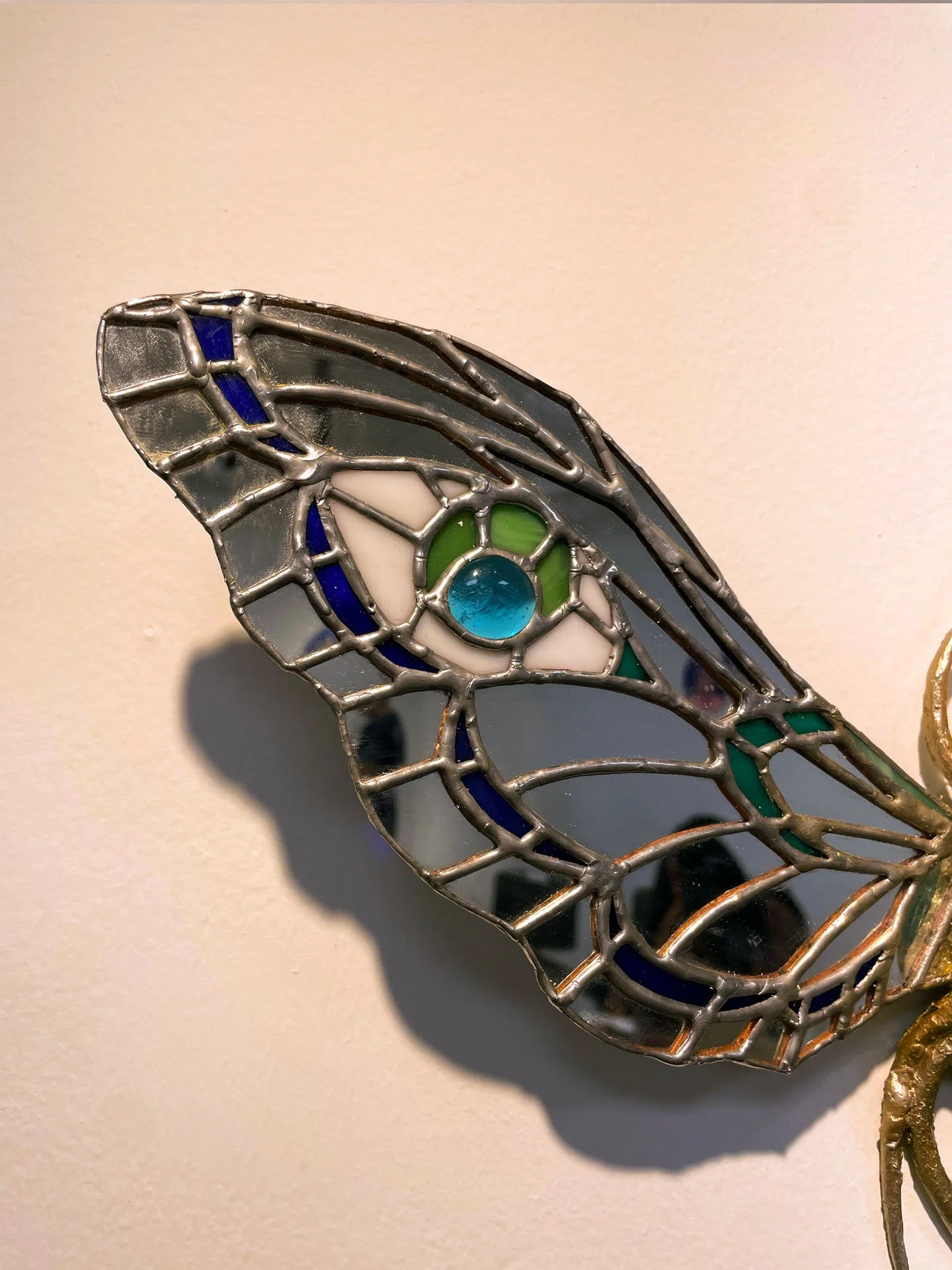 "The Beetle", 2025. Stained glass & mirror, jewels, resin, clay, wire. 
Winner of the 2025 Rhodes College Juried Art Show