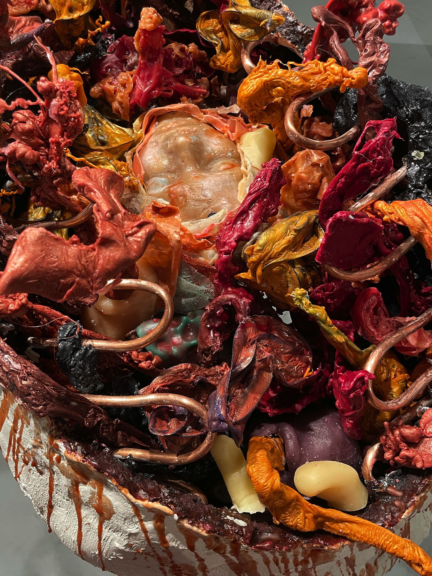 "Spill Your Guts", 2025. Beeswax & thermoplastic wax, plaster, copper, old barn wood.