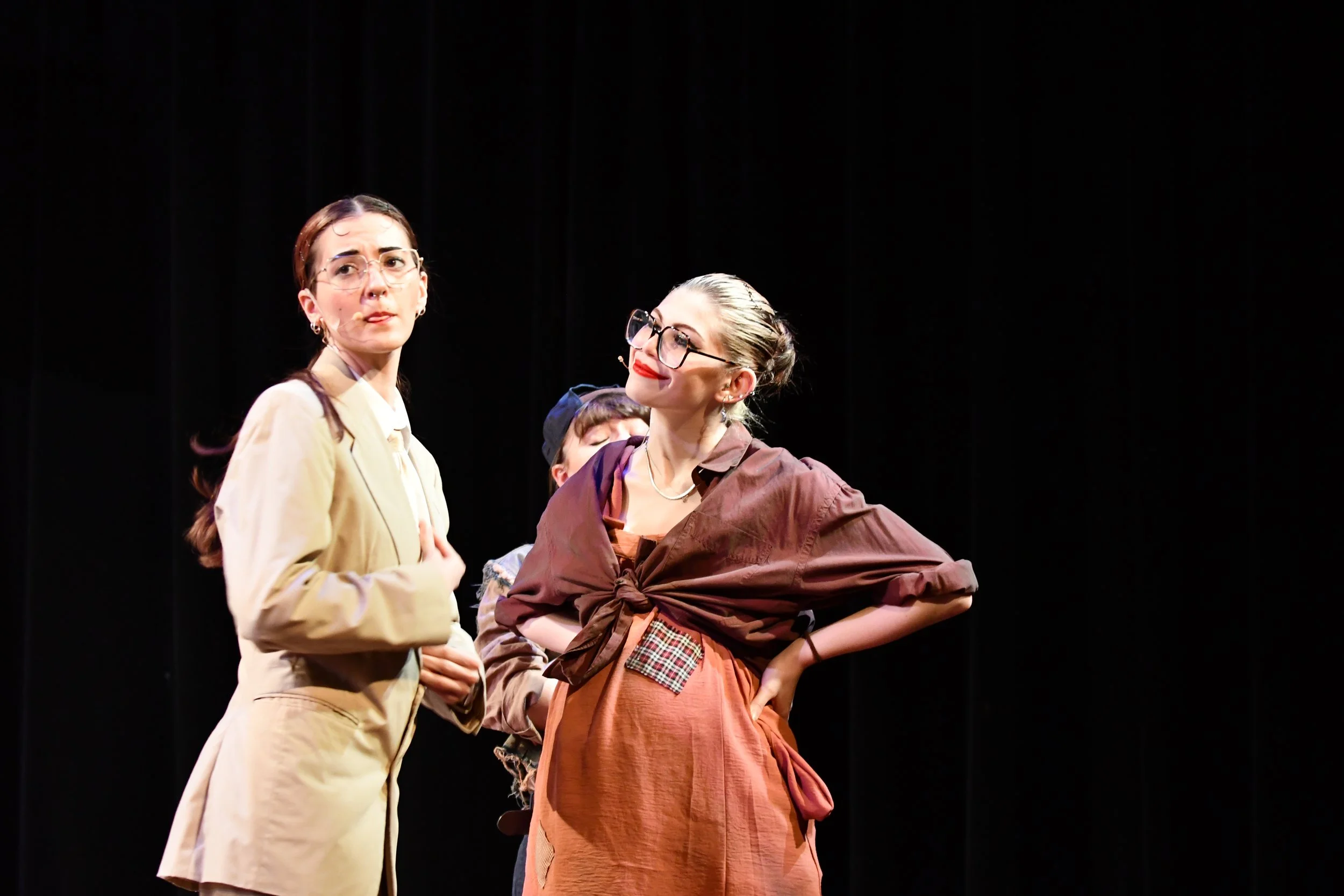"Urinetown", Spring 2026. Directed by Claire D. Kolheim. Written by Greg Kotis. Photo: Cordelia O'Bradovich (left), Kara Lynn Noggle (right).
