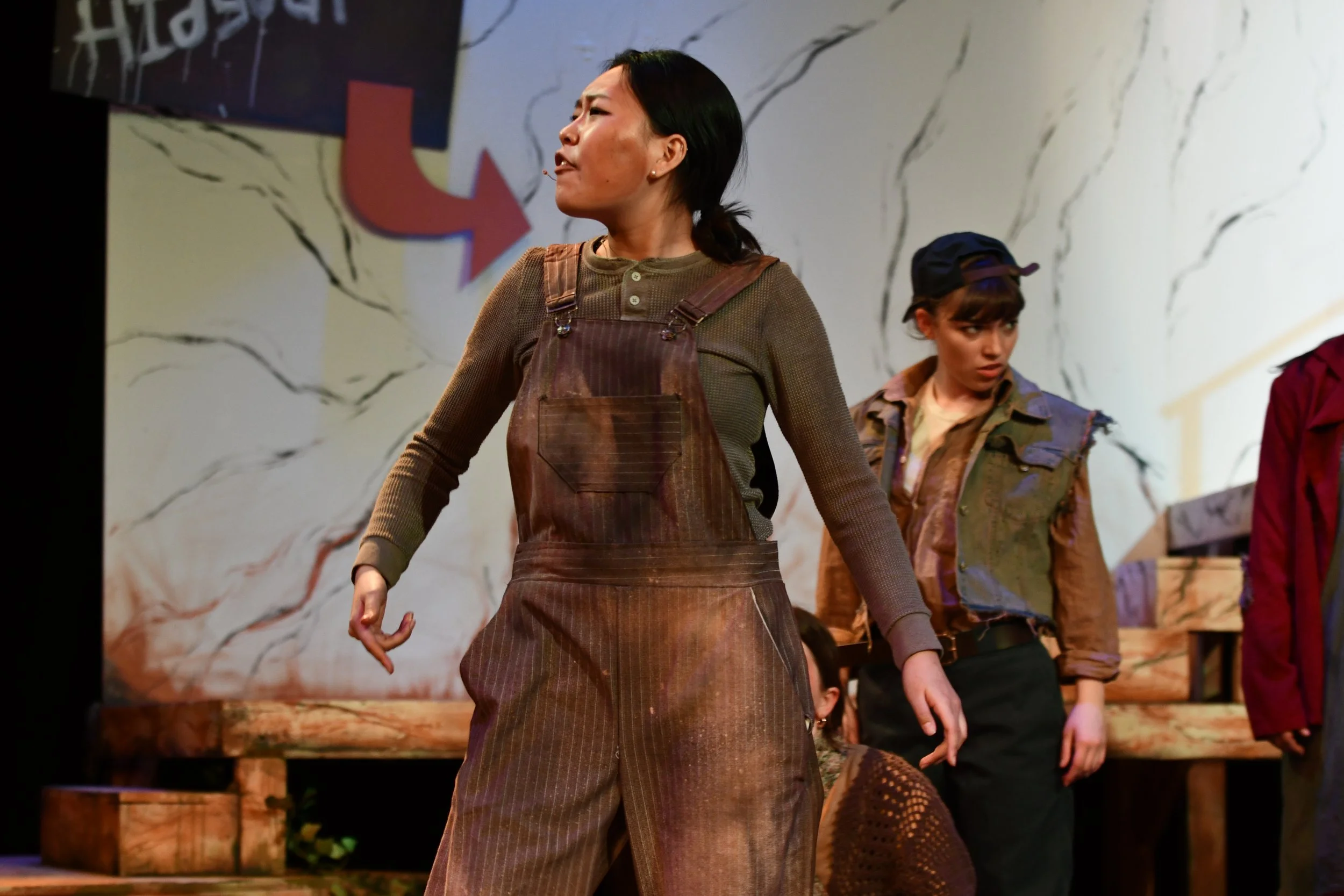 "Urinetown", Spring 2026. Directed by Claire D. Kolheim. Written by Greg Kotis. Photo: Jeongeum Woo (left), Nat Gunter (right). 