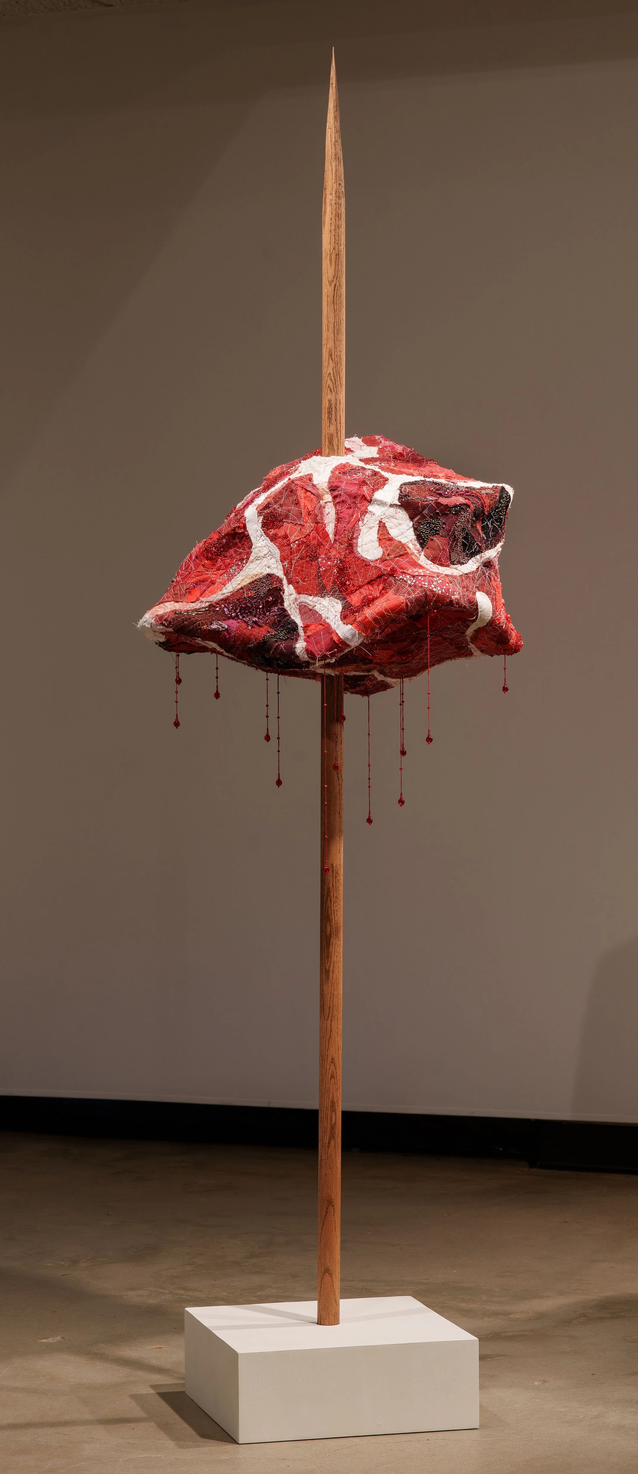 "RAW (meatstick)", 2026. Assorted collaged fabric, thread, wood, wire, pearls & beads. Featured in the 2026 Senior Thesis Exhibition at Rhodes College. [SOLD]
