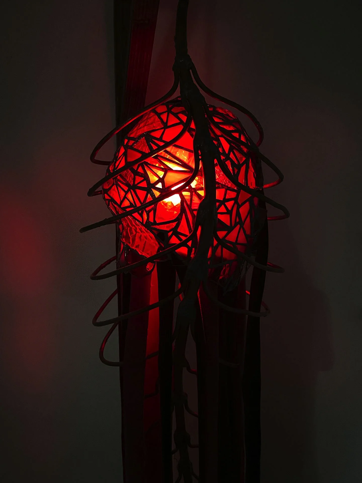 "Cadavera Vero Innumera", 2025. Stained glass, copper, solder, velvet, pine wood, chain, LED lights.