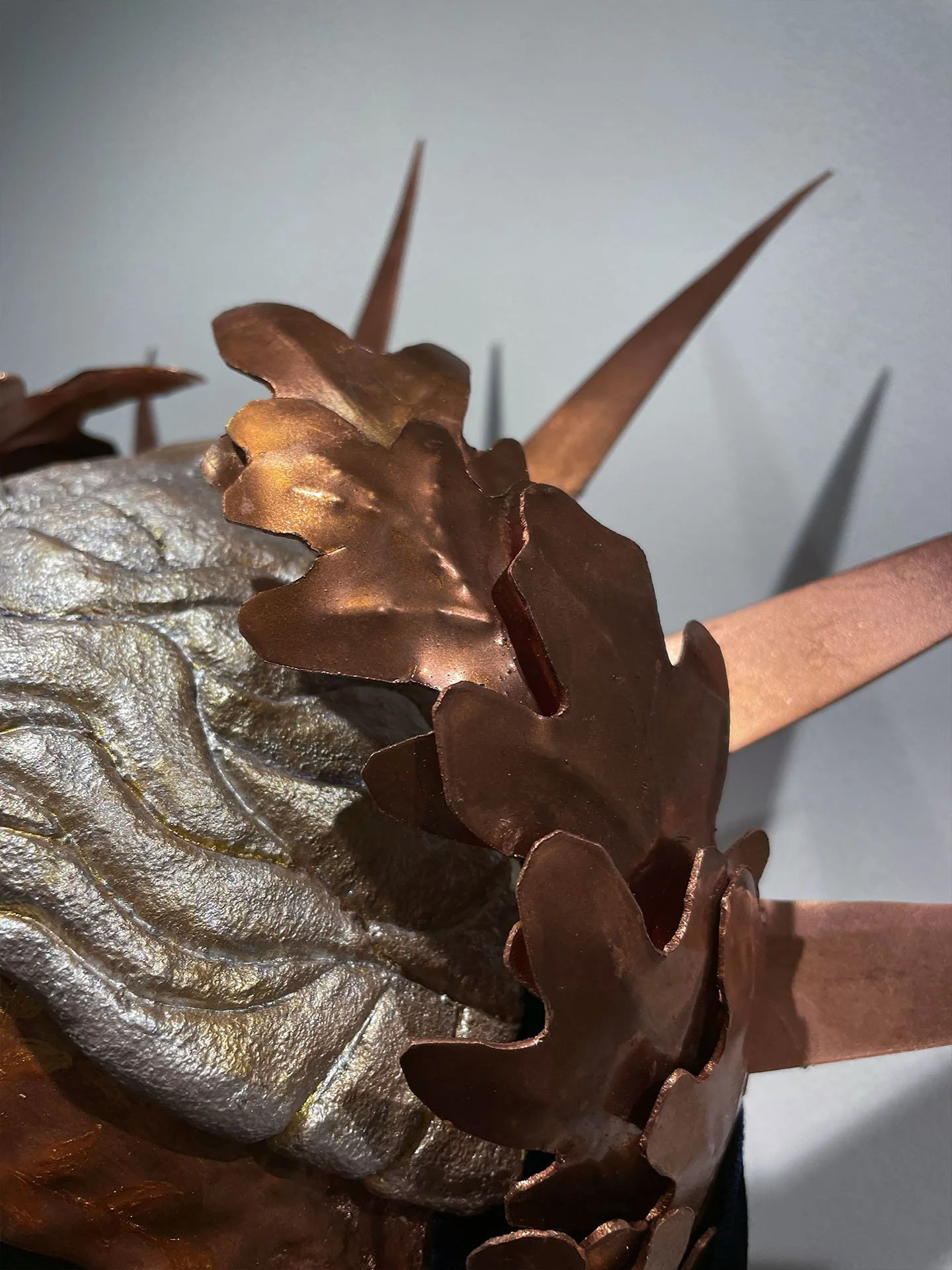 "Mercy Head", 2023. Plaster, clay, thermoplastic resin, copper, paint