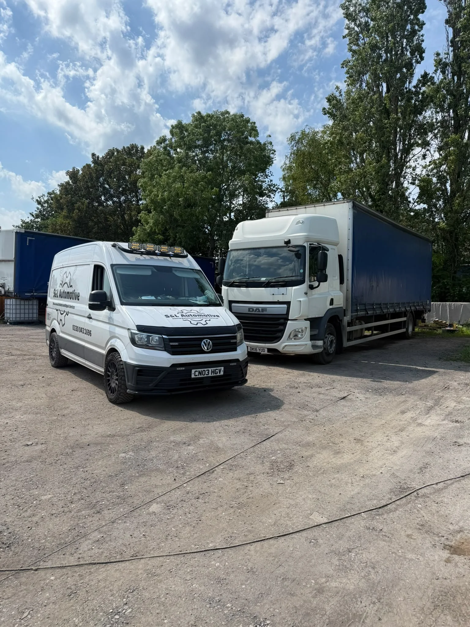 S&L Automotive mobile HGV repair van alongside a DAF truck and trailer at a commercial depot, providing professional on-site HGV servicing, maintenance and repairs across Leyland and the Northwest.