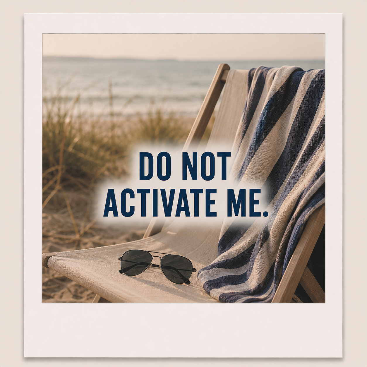 Beach scene with a lounge chair, striped towel, sunglasses, and a sign that says "Do Not Activate Me."