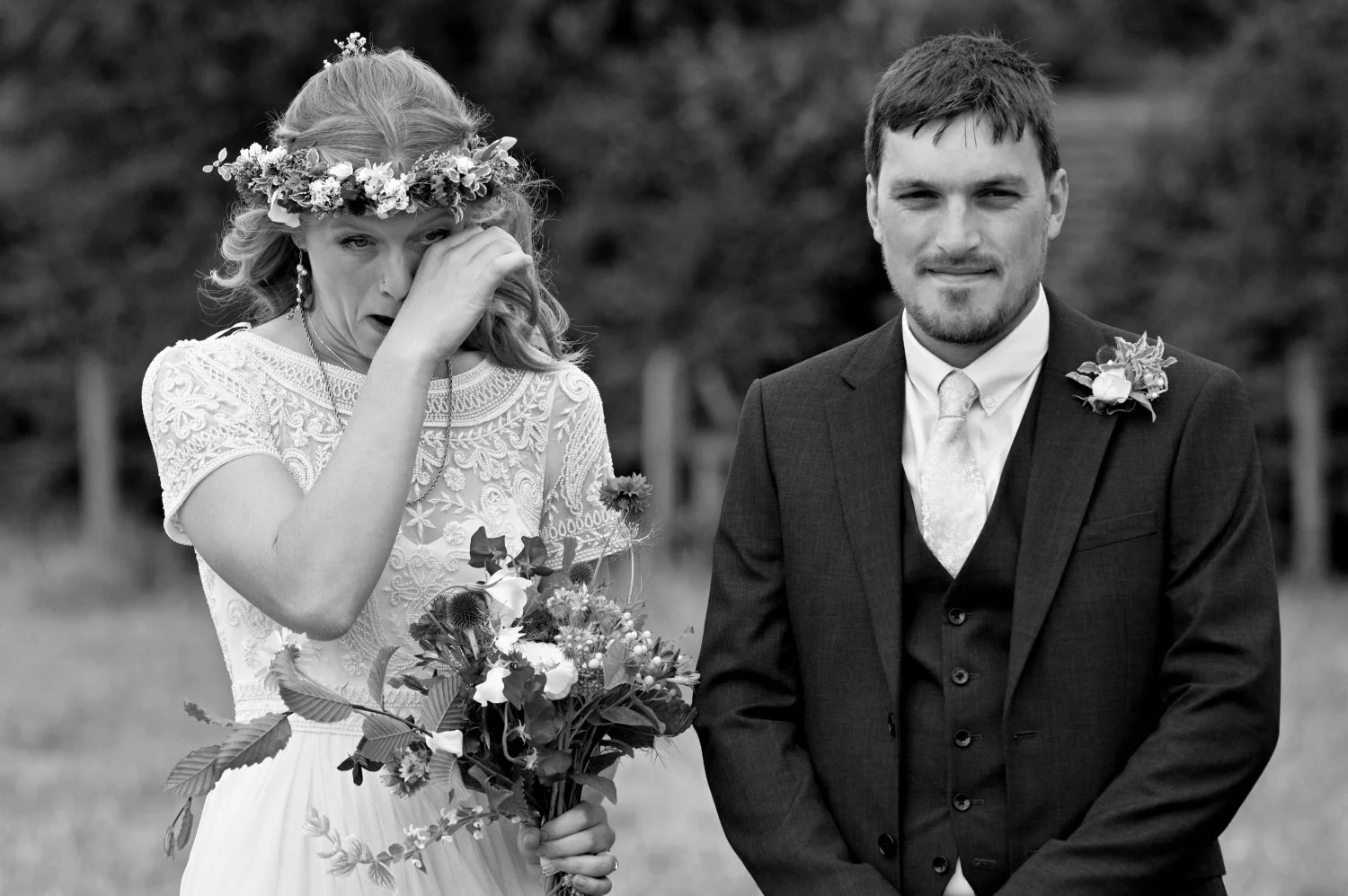 Bride crying with emotion during an outdoor hand-fasting ceremony — candid documentary wedding photography by Tasha Boorman, Nottinghamshire wedding photographer