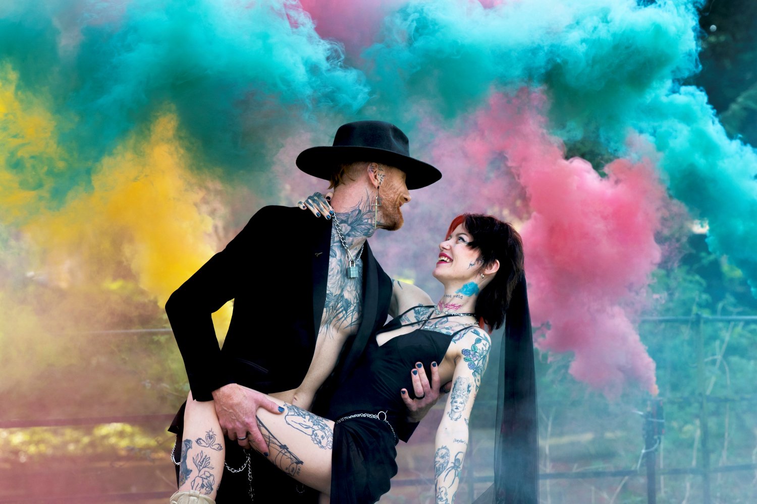 Alternative wedding couple portrait with colourful smoke bombs. creative wedding photography by Tasha Boorman, Nottinghamshire wedding photographer
