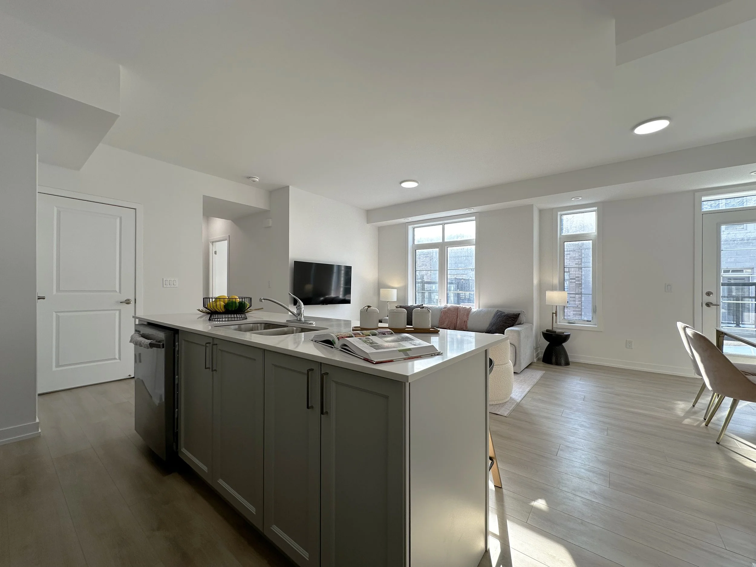 DeerView Heights townhome kitchen and dining area with modern neutral finishes.