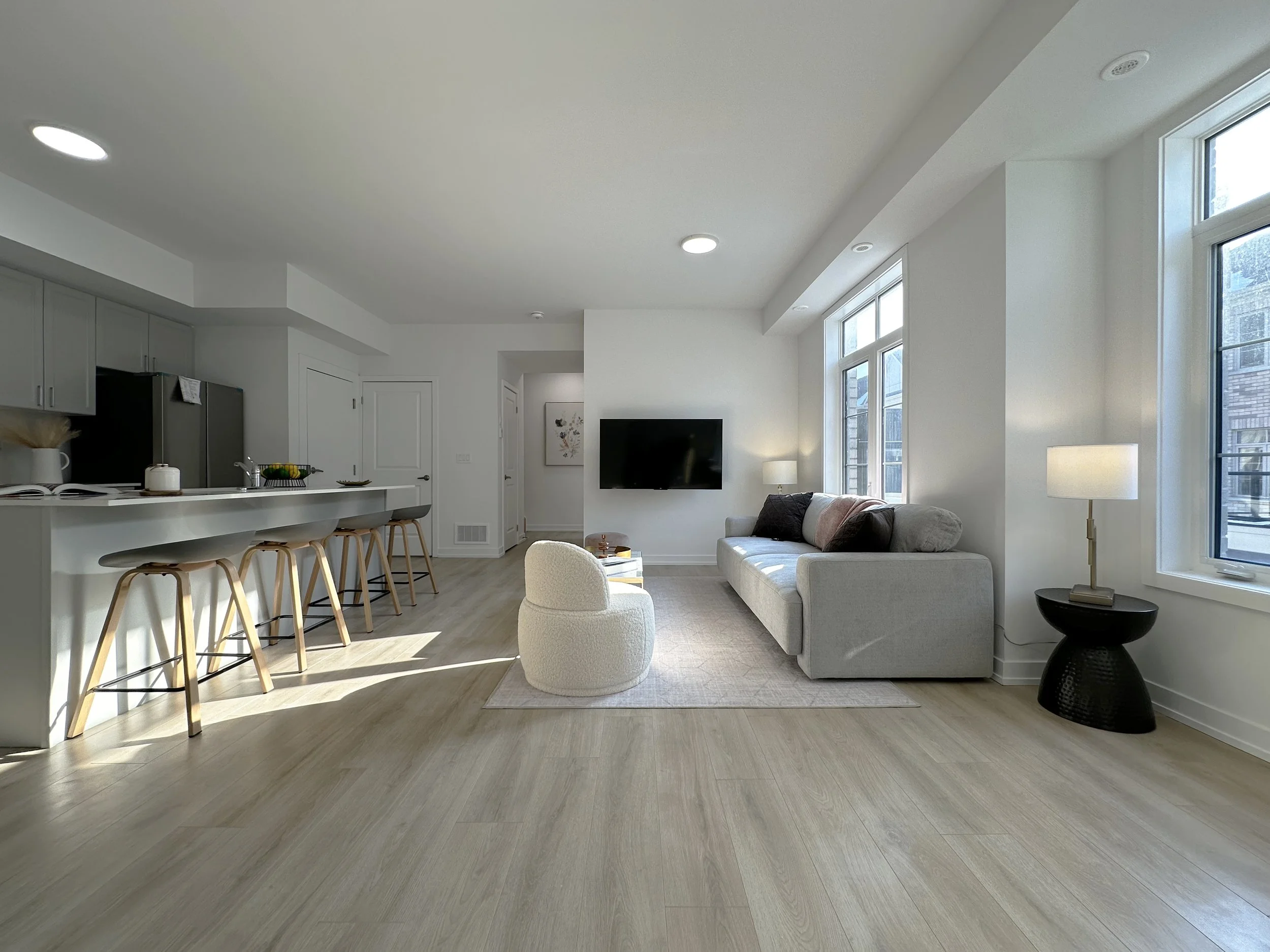  DeerView Heights modern, open-concept living room and kitchen.