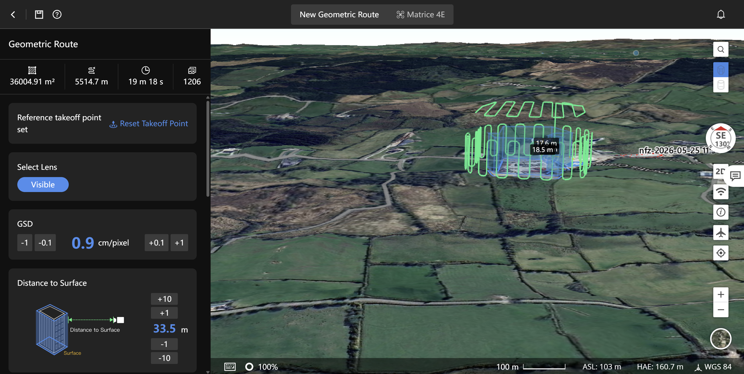 Aerial view of a landscape with green fields, roads, and some buildings. There is a 3D visualization of a geometric route marked in green and blue, with measurements indicating distance and height in meters. The interface shows options for setting reference takeoff points, selecting lenses, and viewing surface distance, with a map scale at the bottom.
