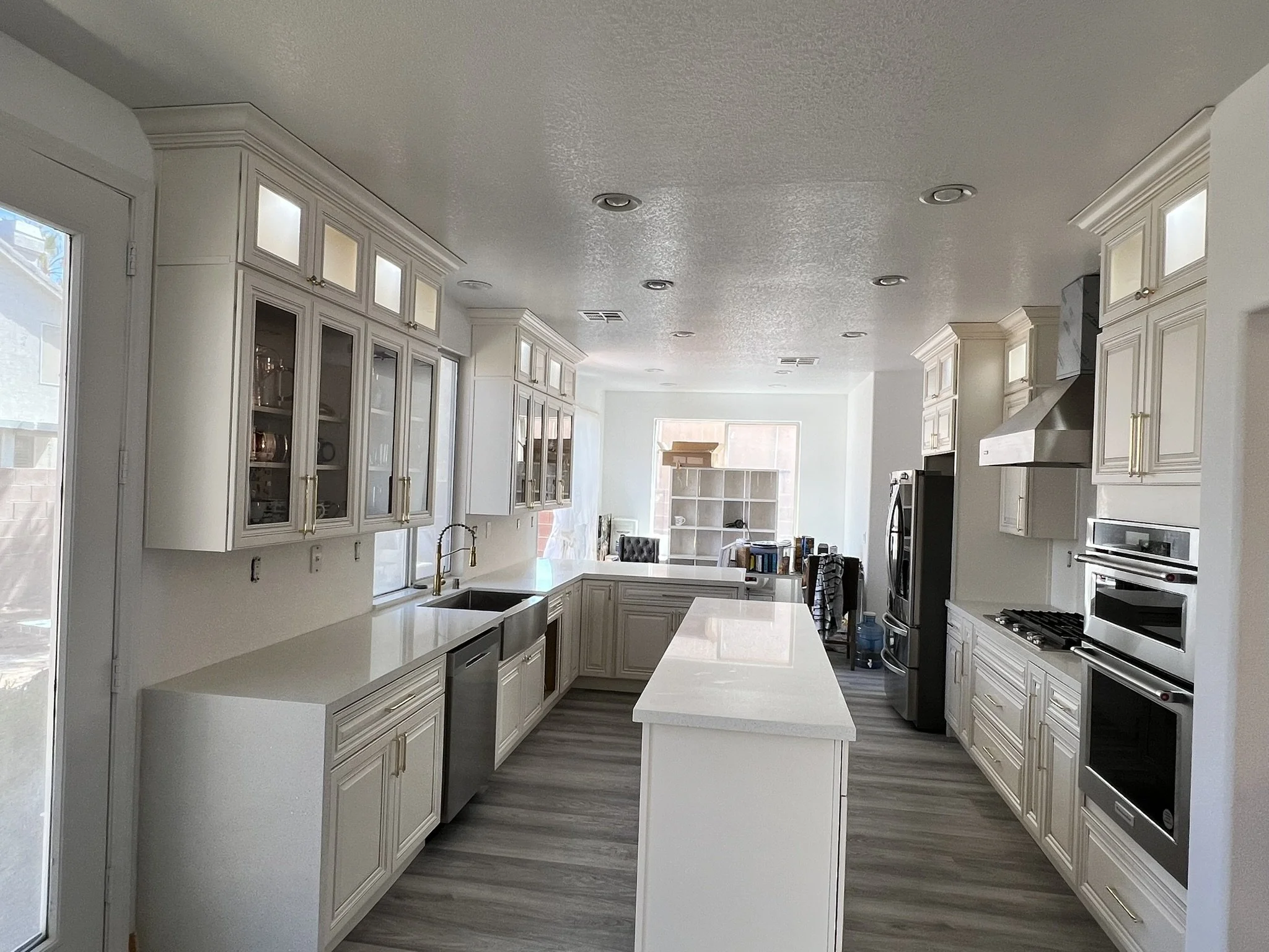 #C  This kitchen has been remodeled with new countertops, cabinets, and flooring. 